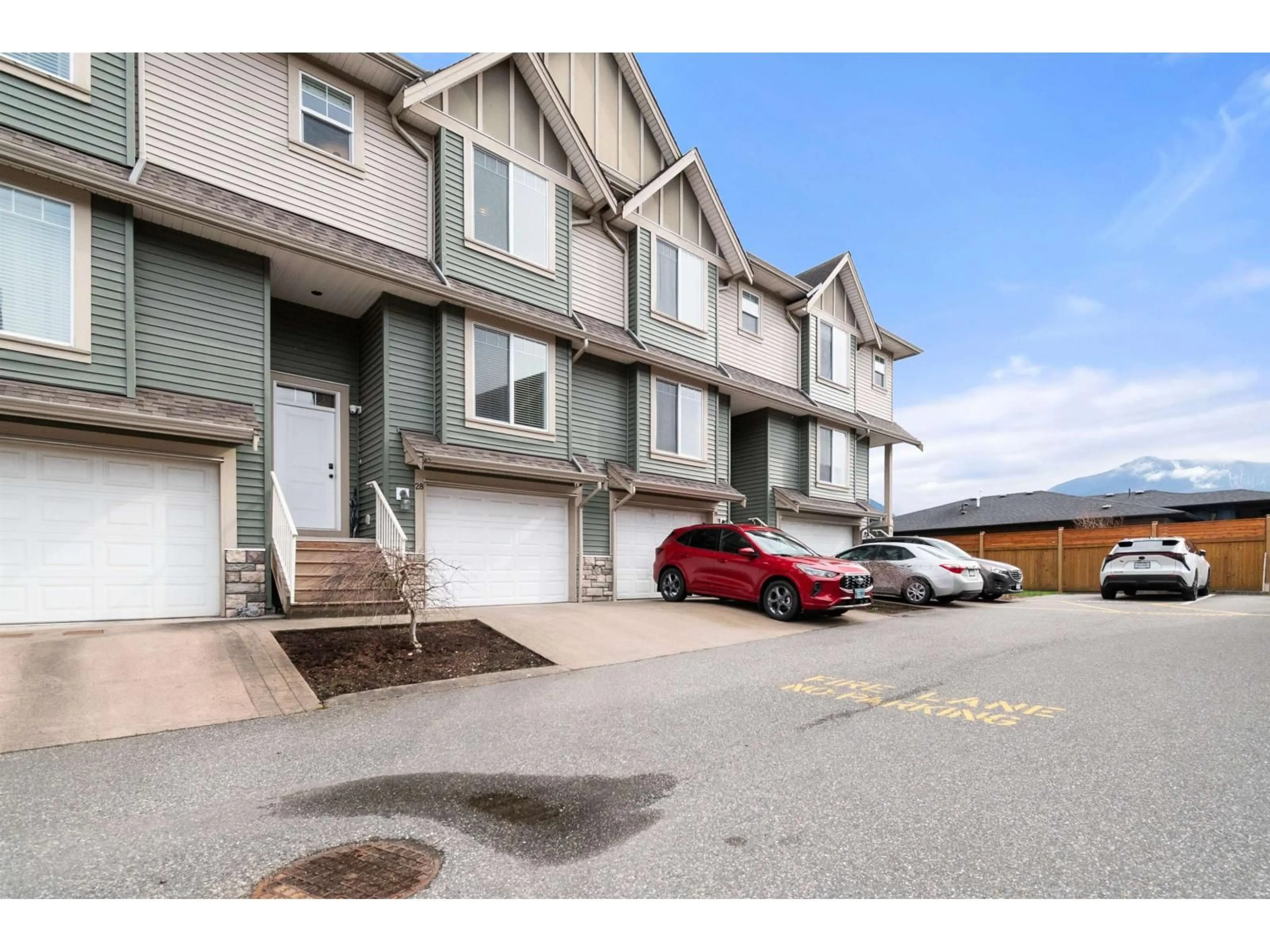 A pic from outside/outdoor area/front of a property/back of a property/a pic from drone, street for 28 - 6498 SOUTHDOWNE PLACE, Chilliwack British Columbia V2R0K3