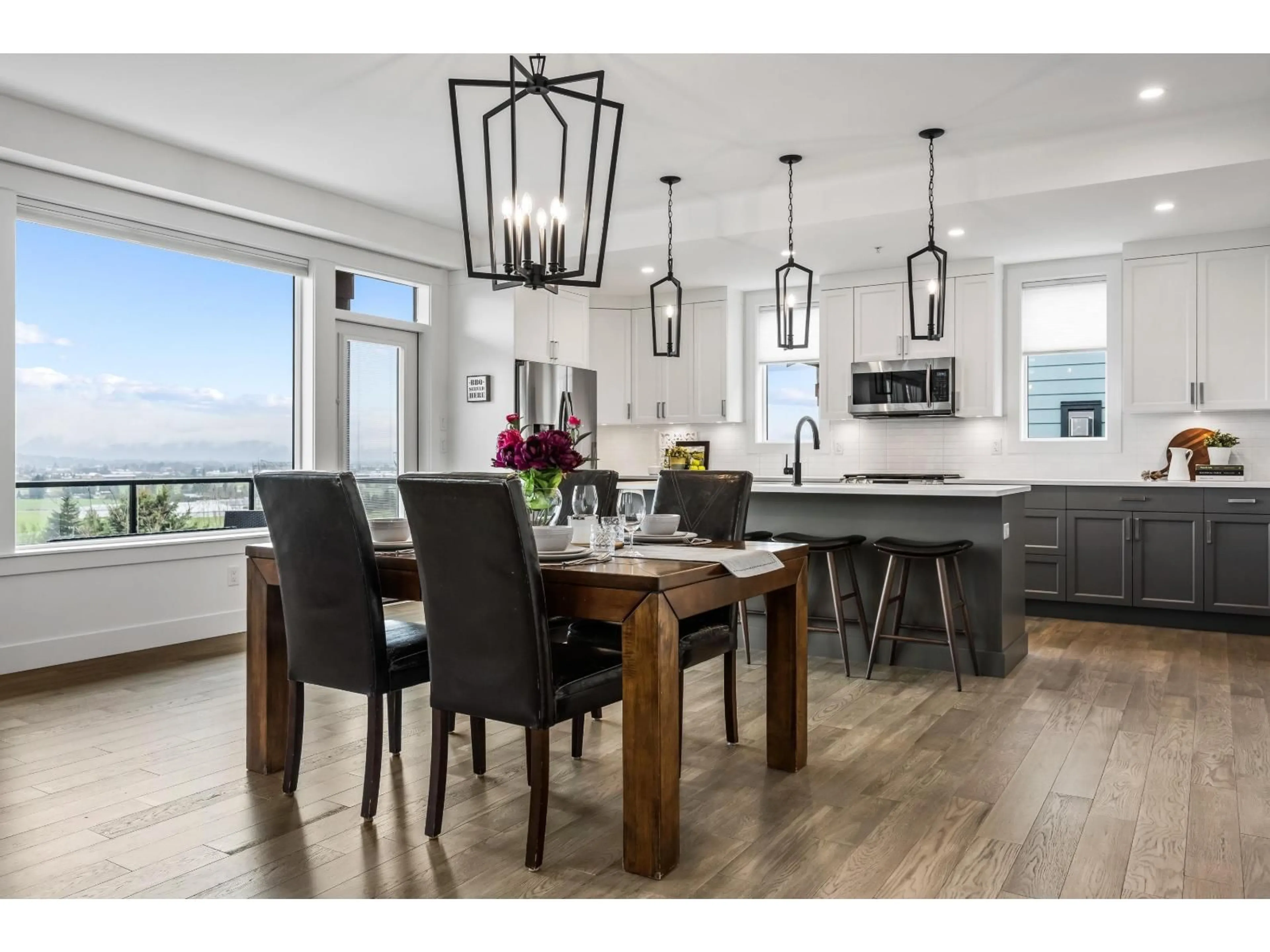 Open concept kitchen, wood/laminate floor for 50957 SOPHIE CRESCENT, Chilliwack British Columbia V4Z0C1