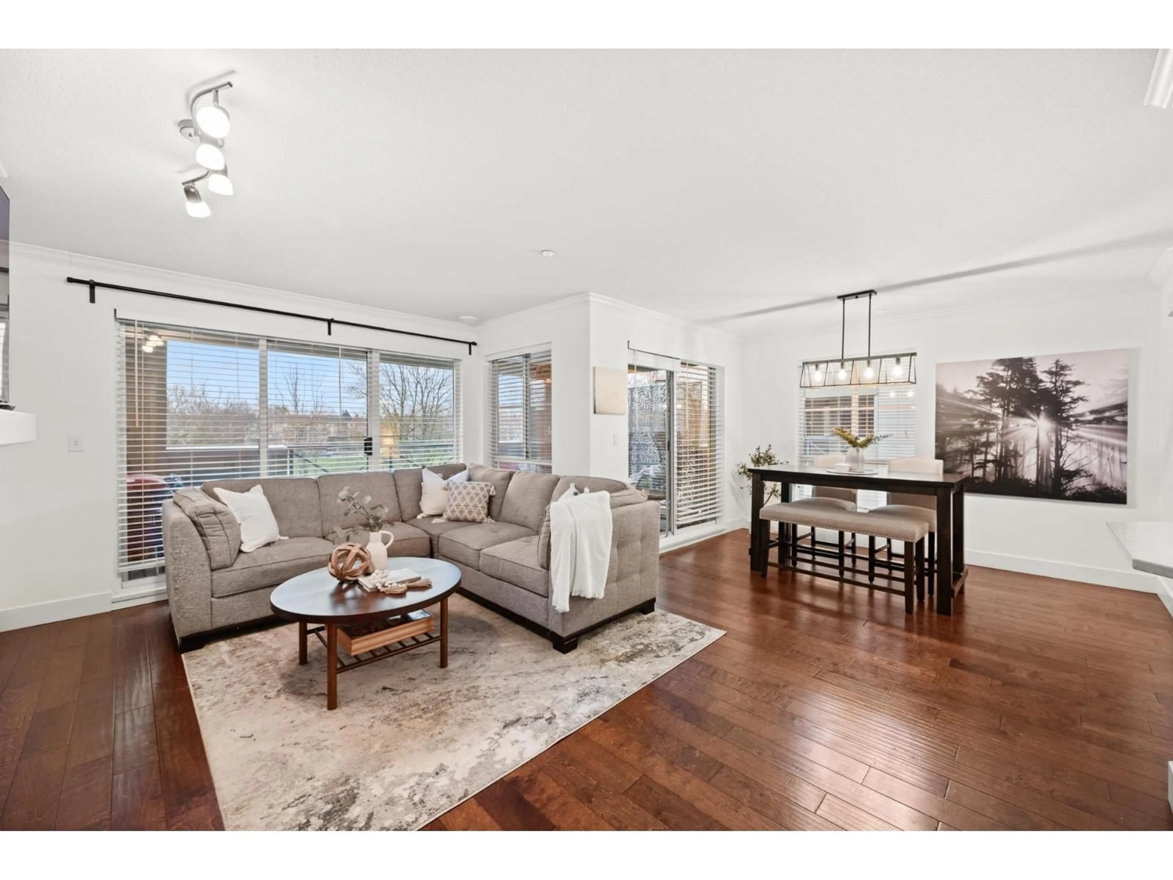Living room with furniture, wood/laminate floor for 304 - 20110 MICHAUD CRESCENT, Langley British Columbia V3A4B1