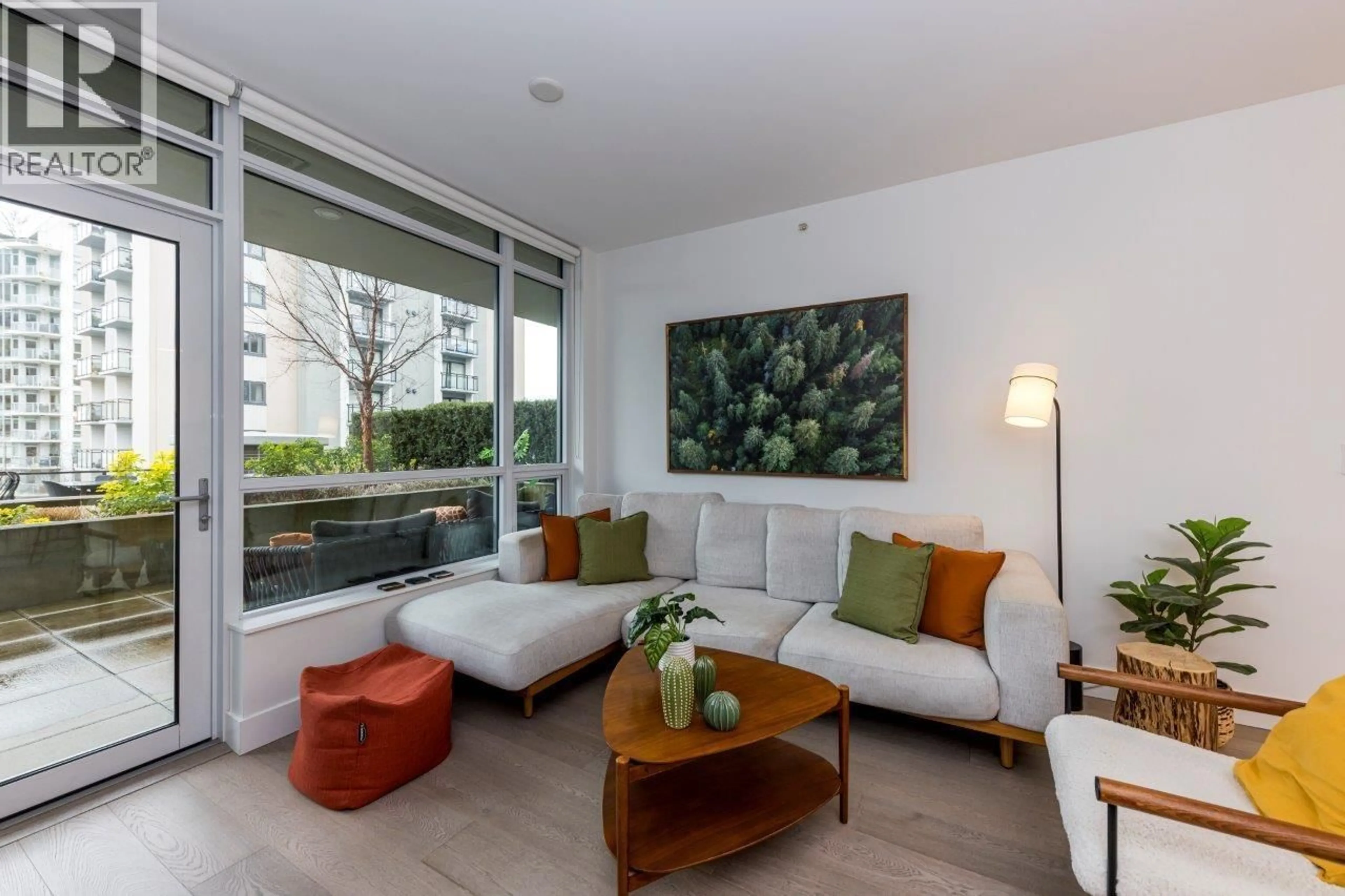 Living room with furniture, unknown for 206 - 177 3RD STREET, North Vancouver British Columbia V7M0G5