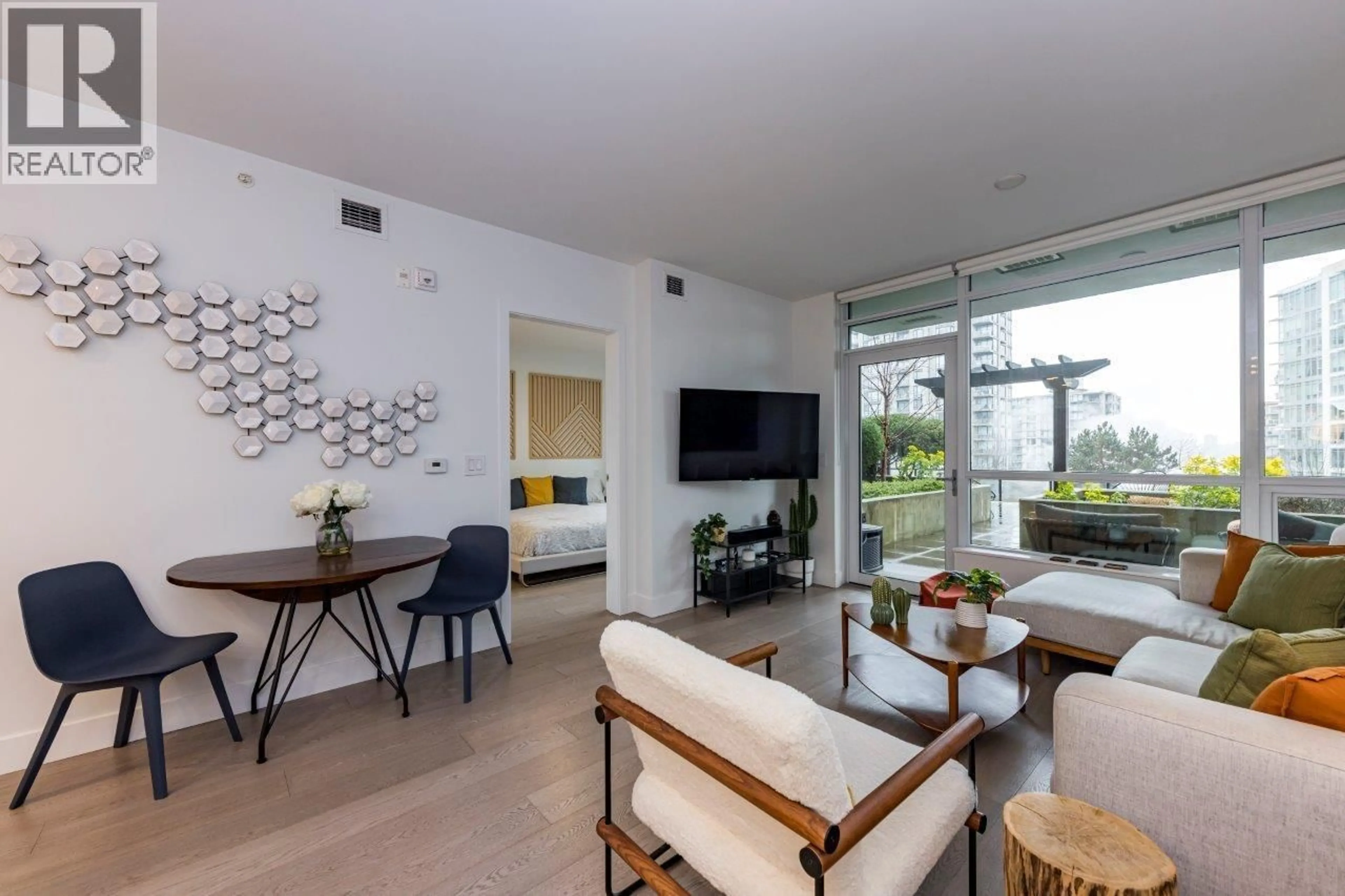 Living room with furniture, unknown for 206 - 177 3RD STREET, North Vancouver British Columbia V7M0G5