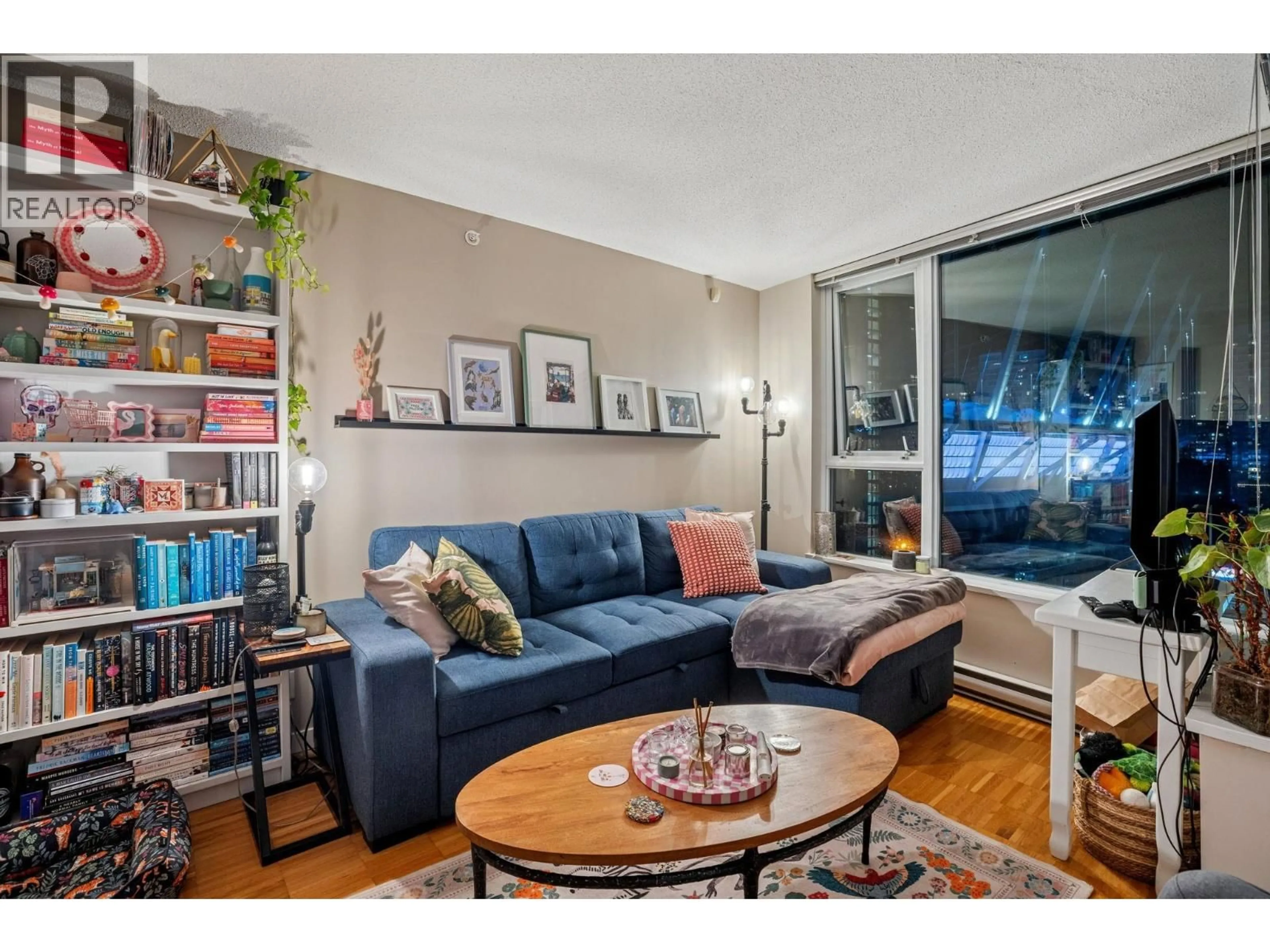 Living room with furniture, wood/laminate floor for 1901 - 33 SMITHE STREET, Vancouver British Columbia V6B0B5