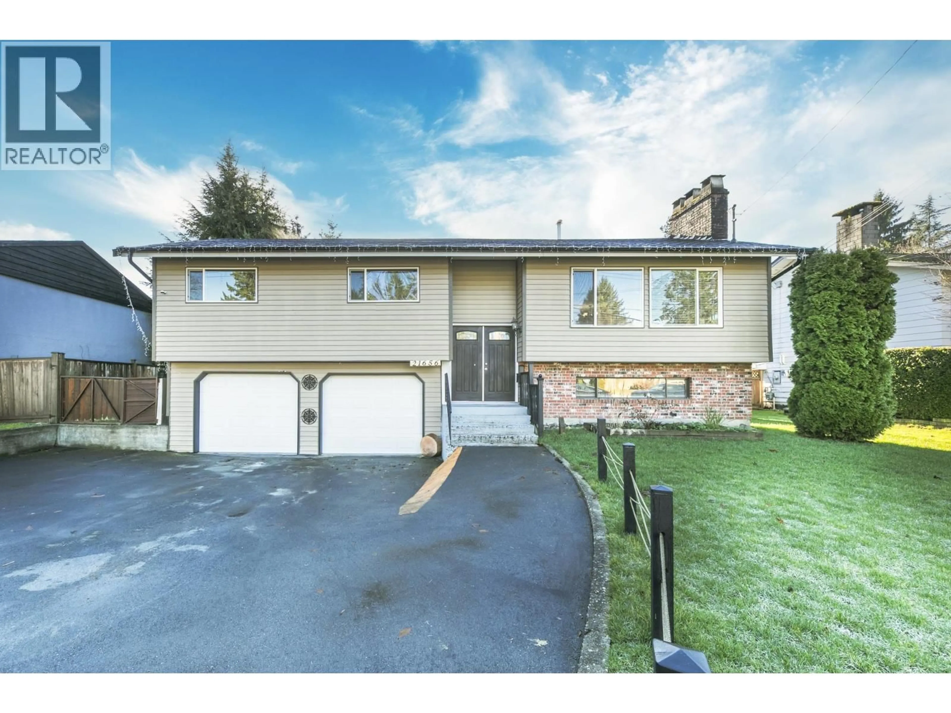 Home with vinyl exterior material, street for 21656 DONOVAN AVENUE, Maple Ridge British Columbia V2X3A3