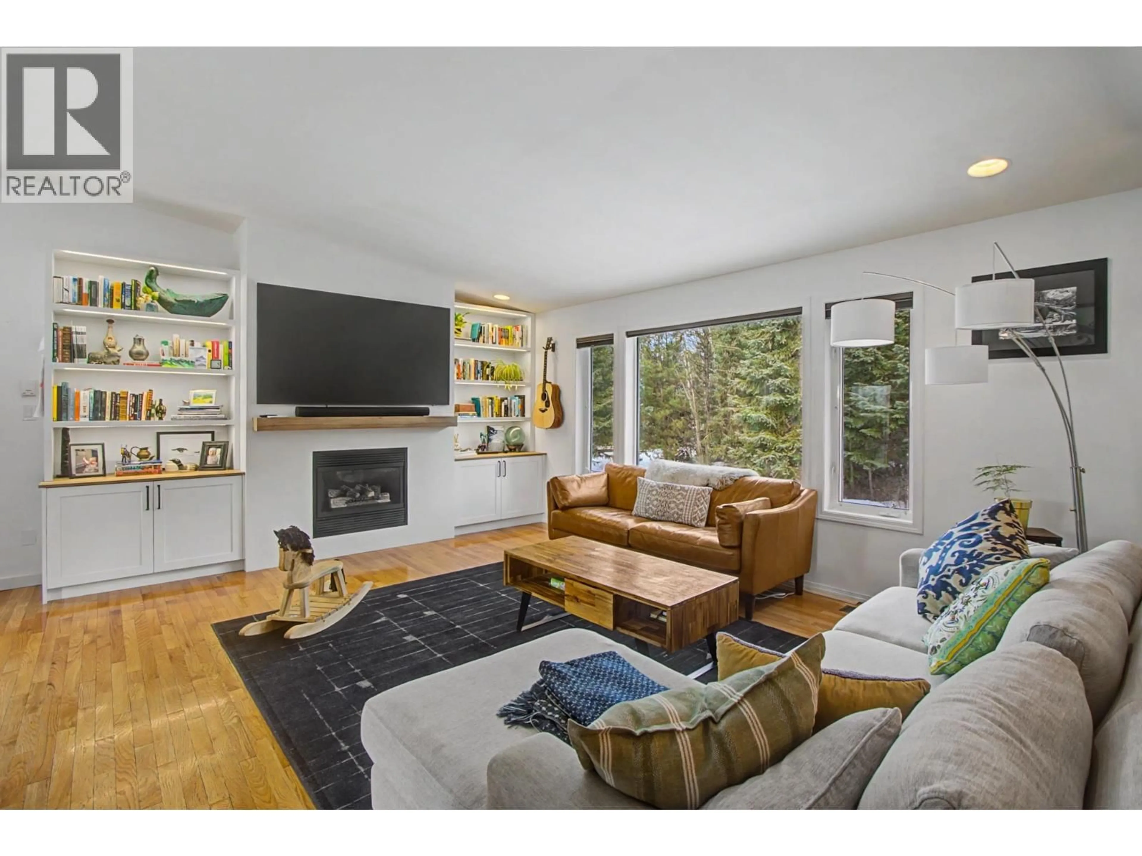 Living room with furniture, wood/laminate floor for 6655 NORTH NECHAKO ROAD, Prince George British Columbia V2K4Z4