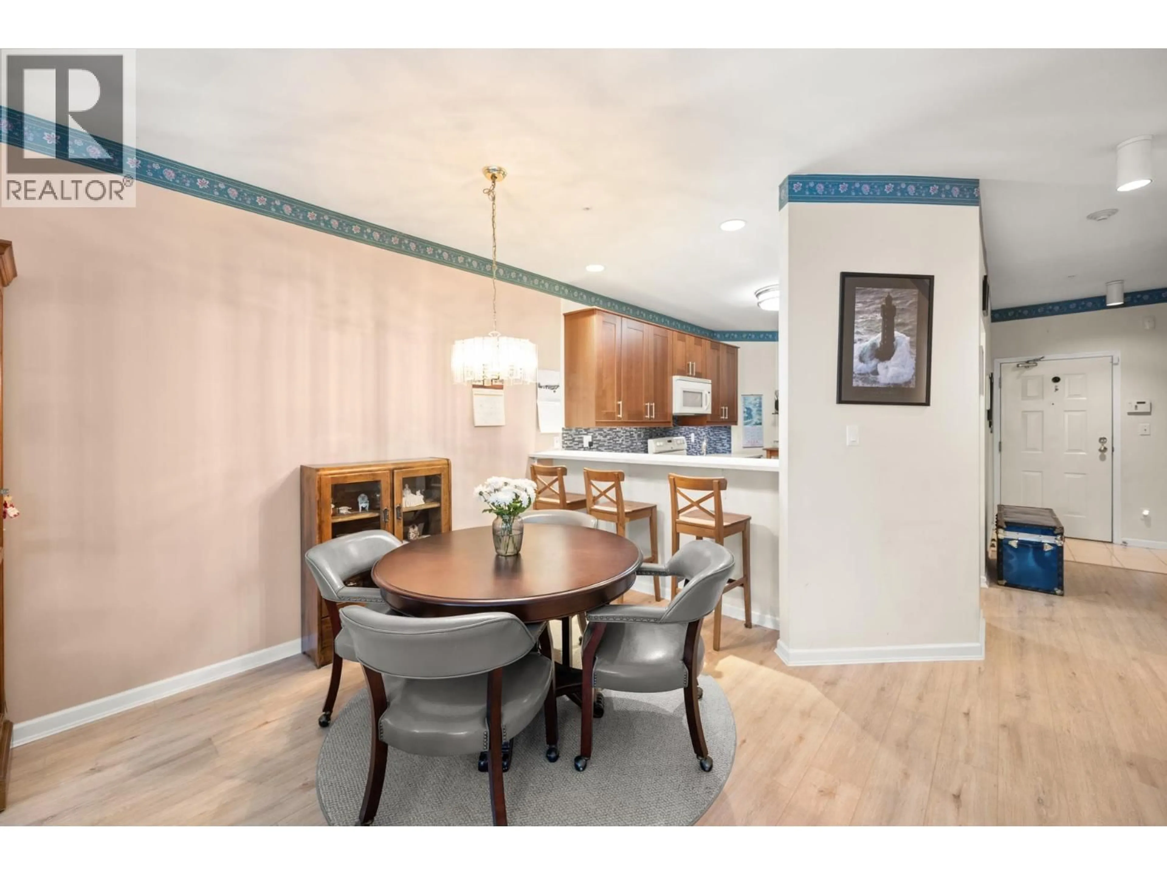 Dining room, wood/laminate floor for 108 - 4753 WEST RIVER ROAD, Delta British Columbia V4K1R9