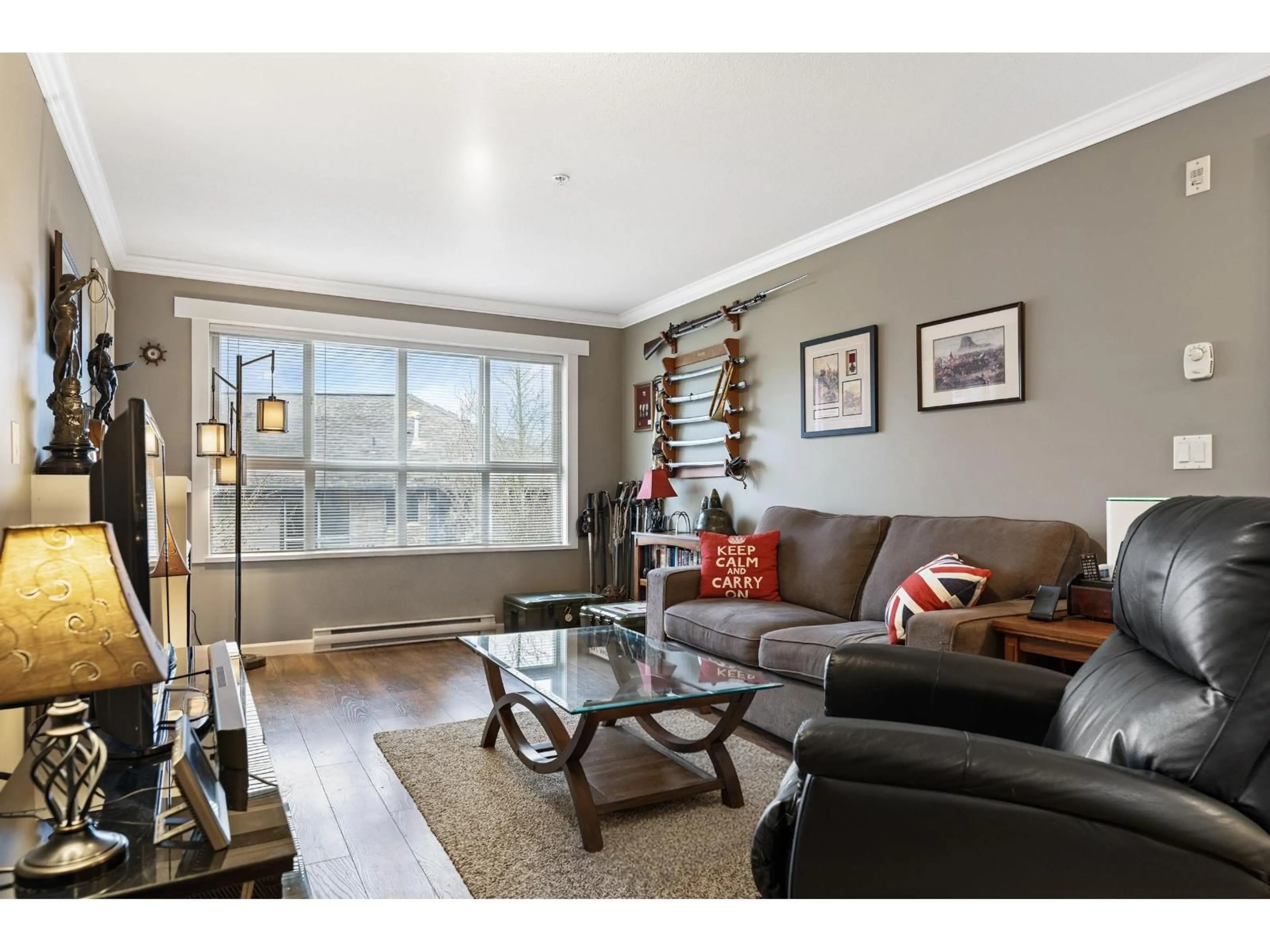 Living room with furniture, wood/laminate floor for 309 - 6815 188 STREET, Surrey British Columbia V4N0Z8