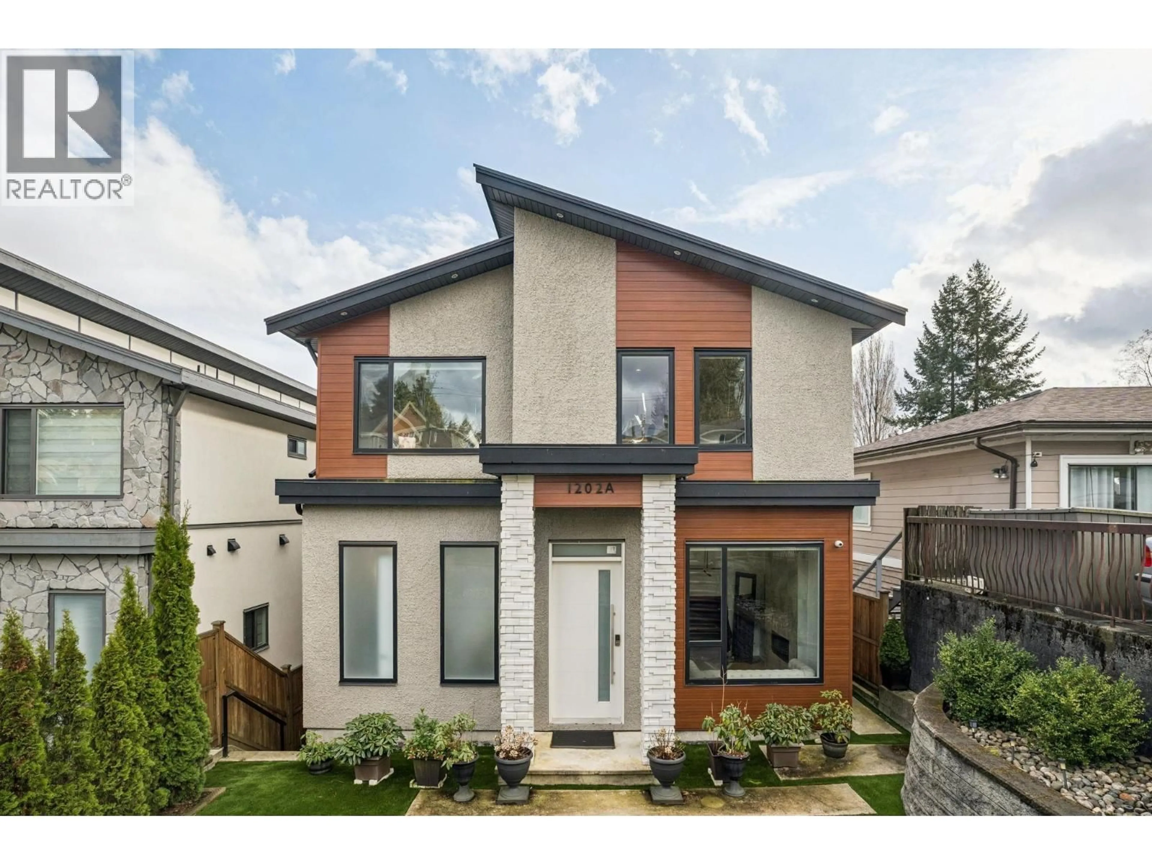 Home with brick exterior material, street for 1202A HAMMOND AVENUE, Coquitlam British Columbia V3K2P1