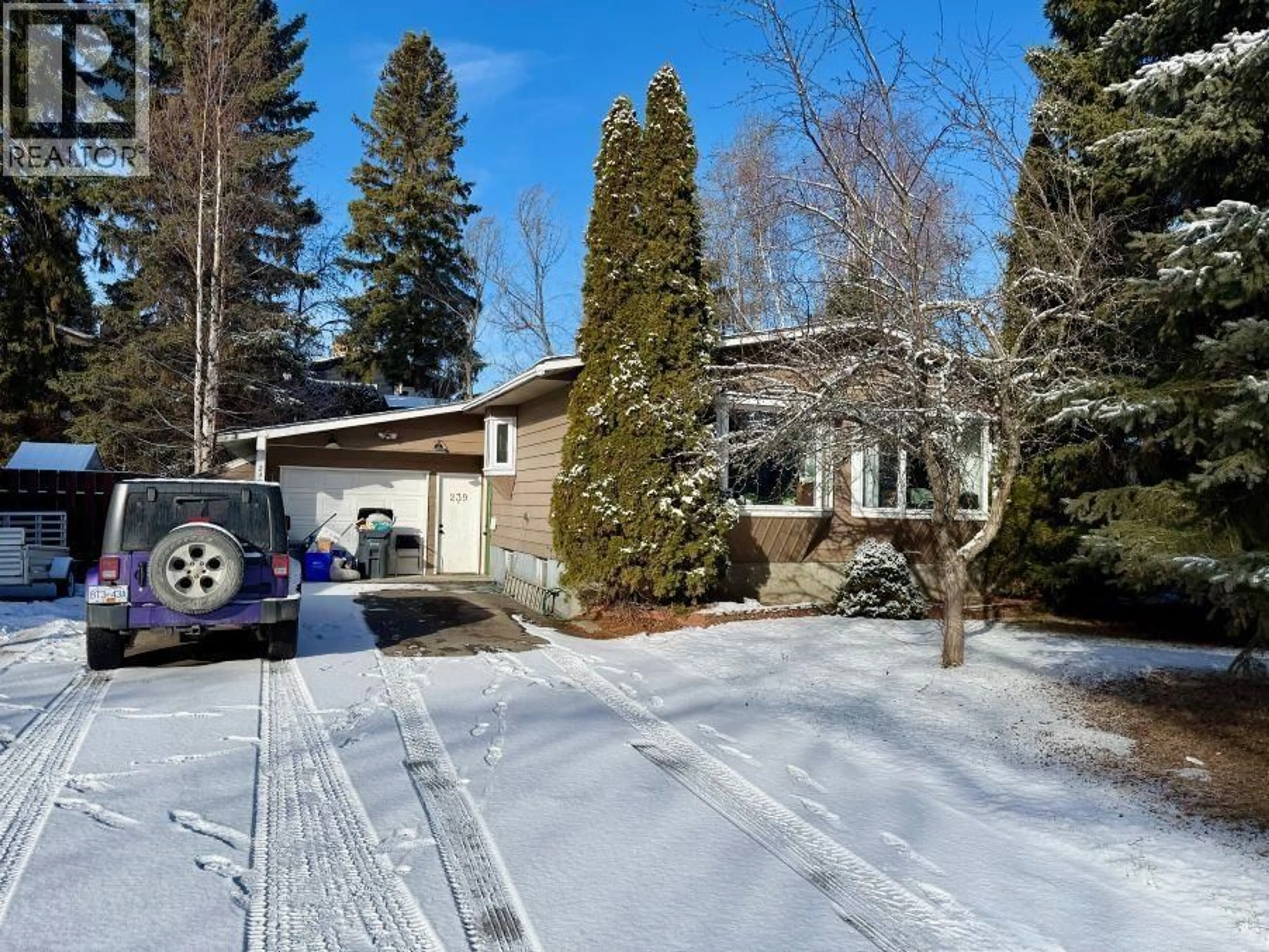 A pic from outside/outdoor area/front of a property/back of a property/a pic from drone, street for 239 FERN CRESCENT, Prince George British Columbia V2N1J5