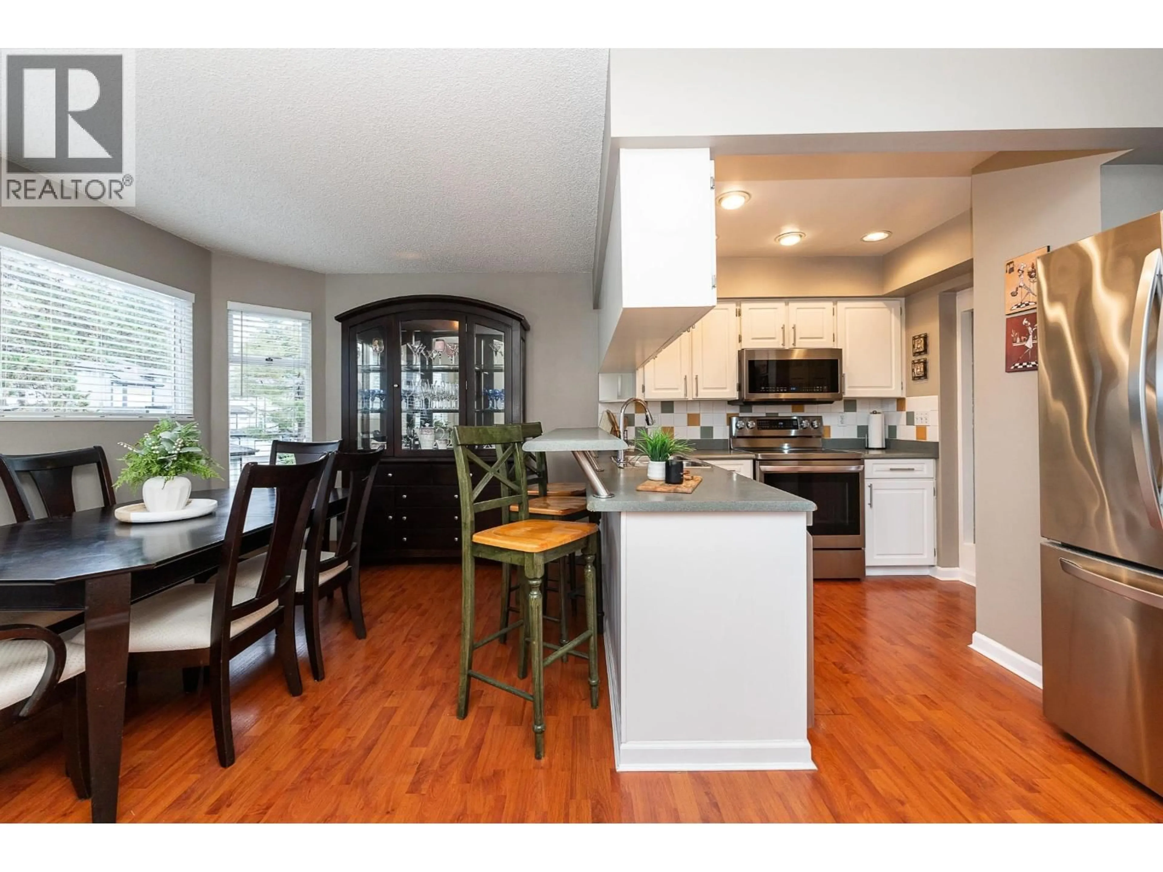 Open concept kitchen, wood/laminate floor for 35 - 1195 FALCON DRIVE, Coquitlam British Columbia V3E2H1