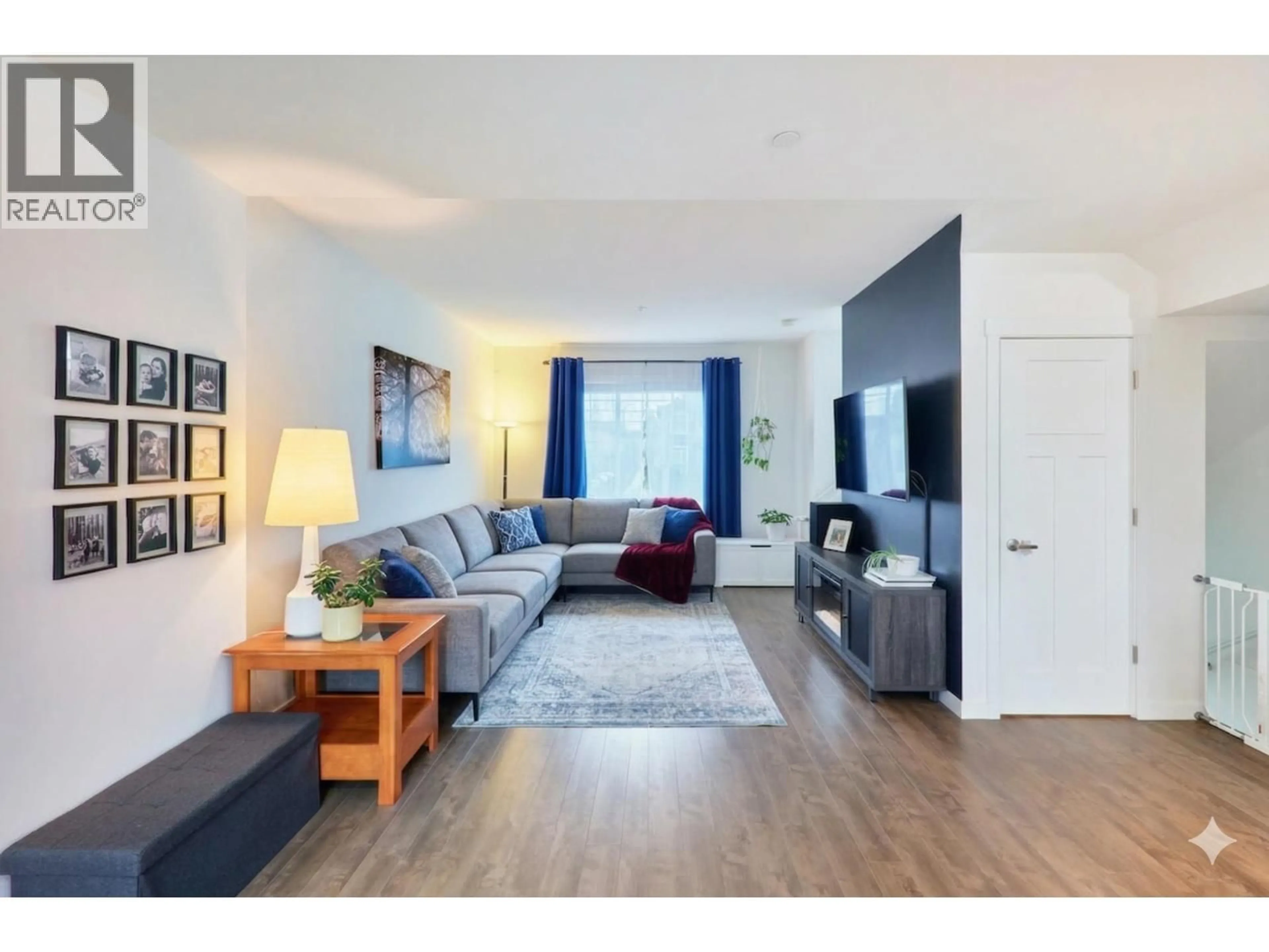 Living room with furniture, wood/laminate floor for 47 - 11272 240 STREET, Maple Ridge British Columbia V2W0J8