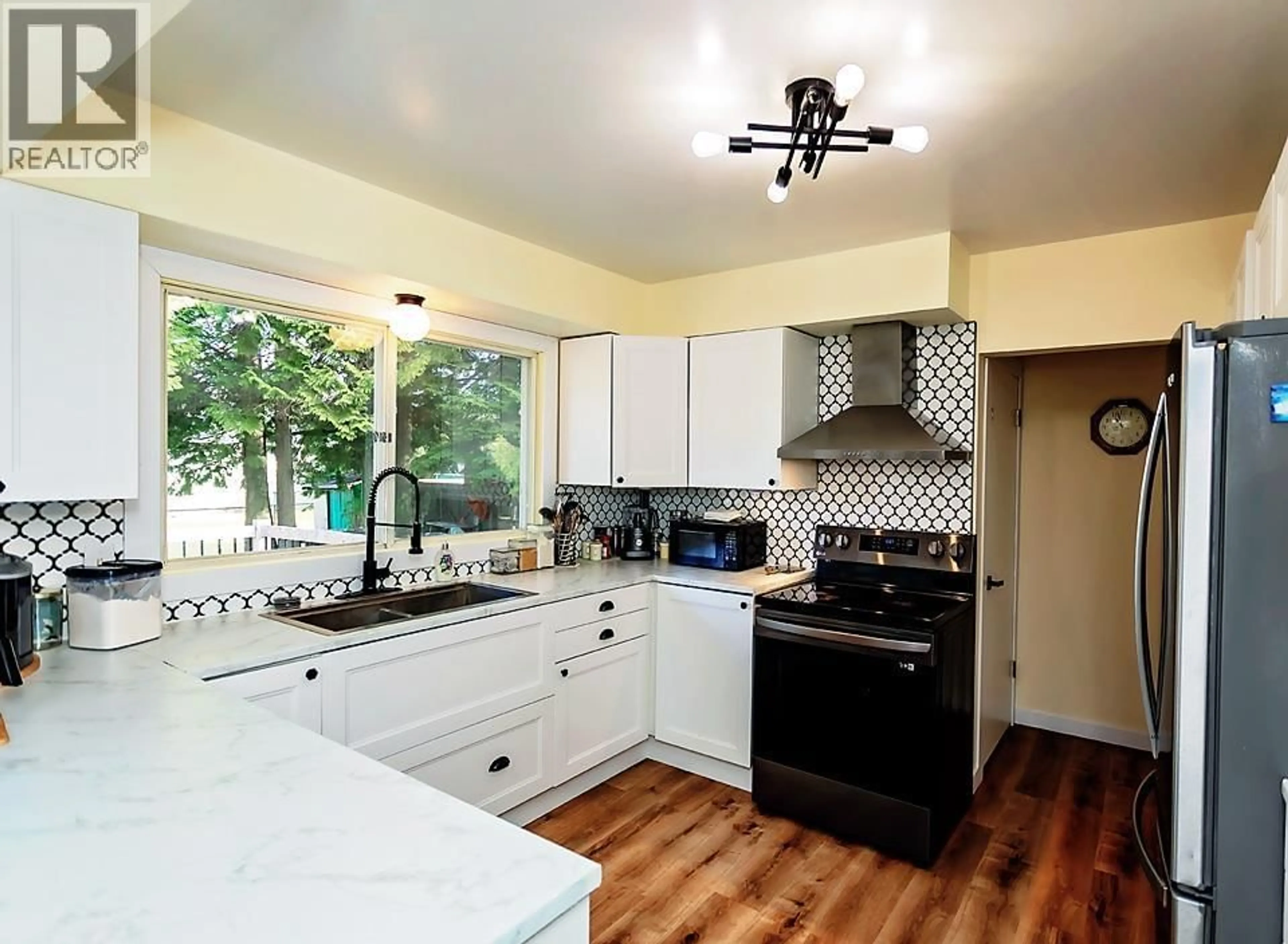 Open concept kitchen, ceramic/tile floor for 4824 OLSON AVENUE, Terrace British Columbia V8G2A6