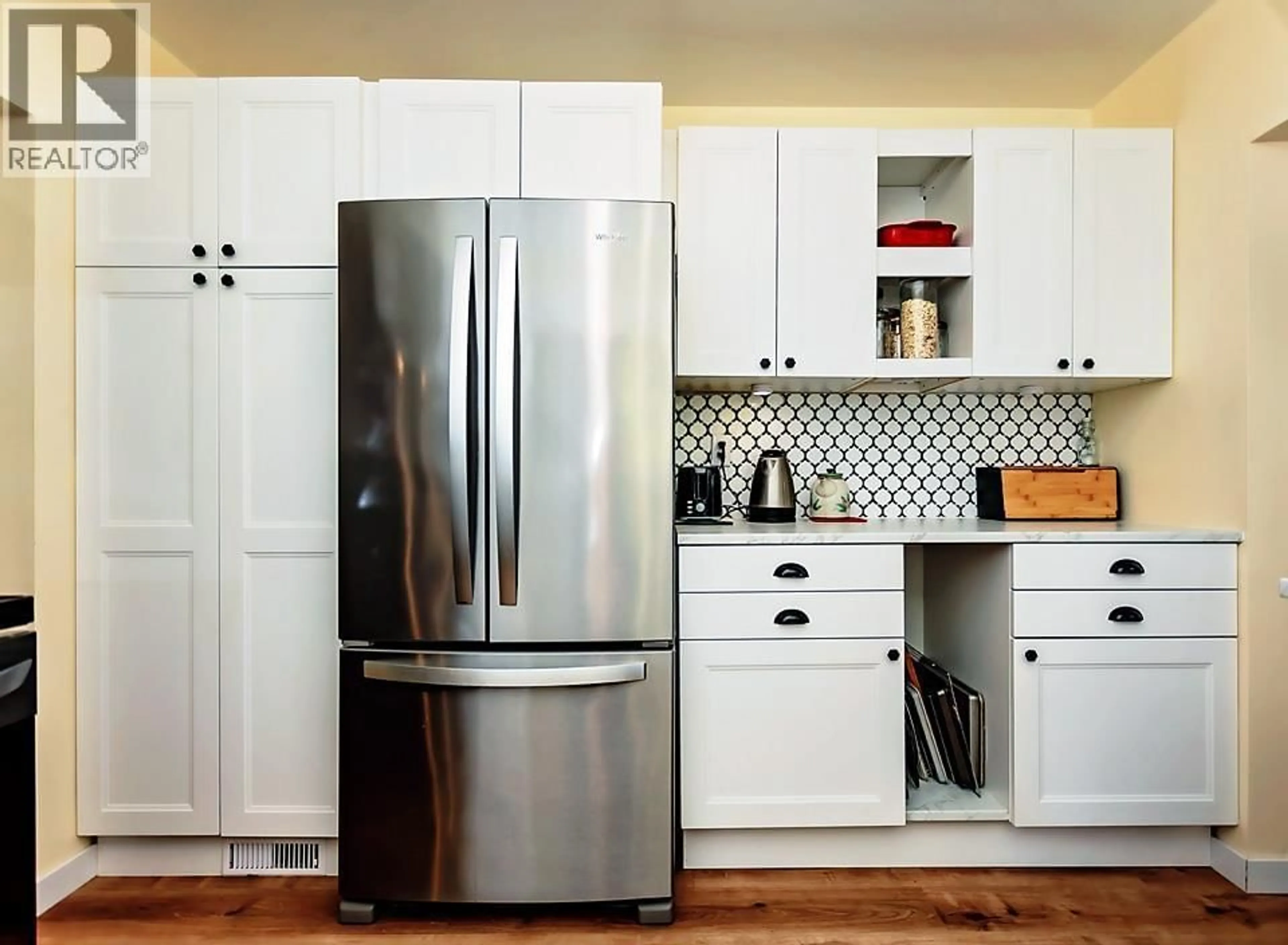 Contemporary kitchen, wood/laminate floor for 4824 OLSON AVENUE, Terrace British Columbia V8G2A6