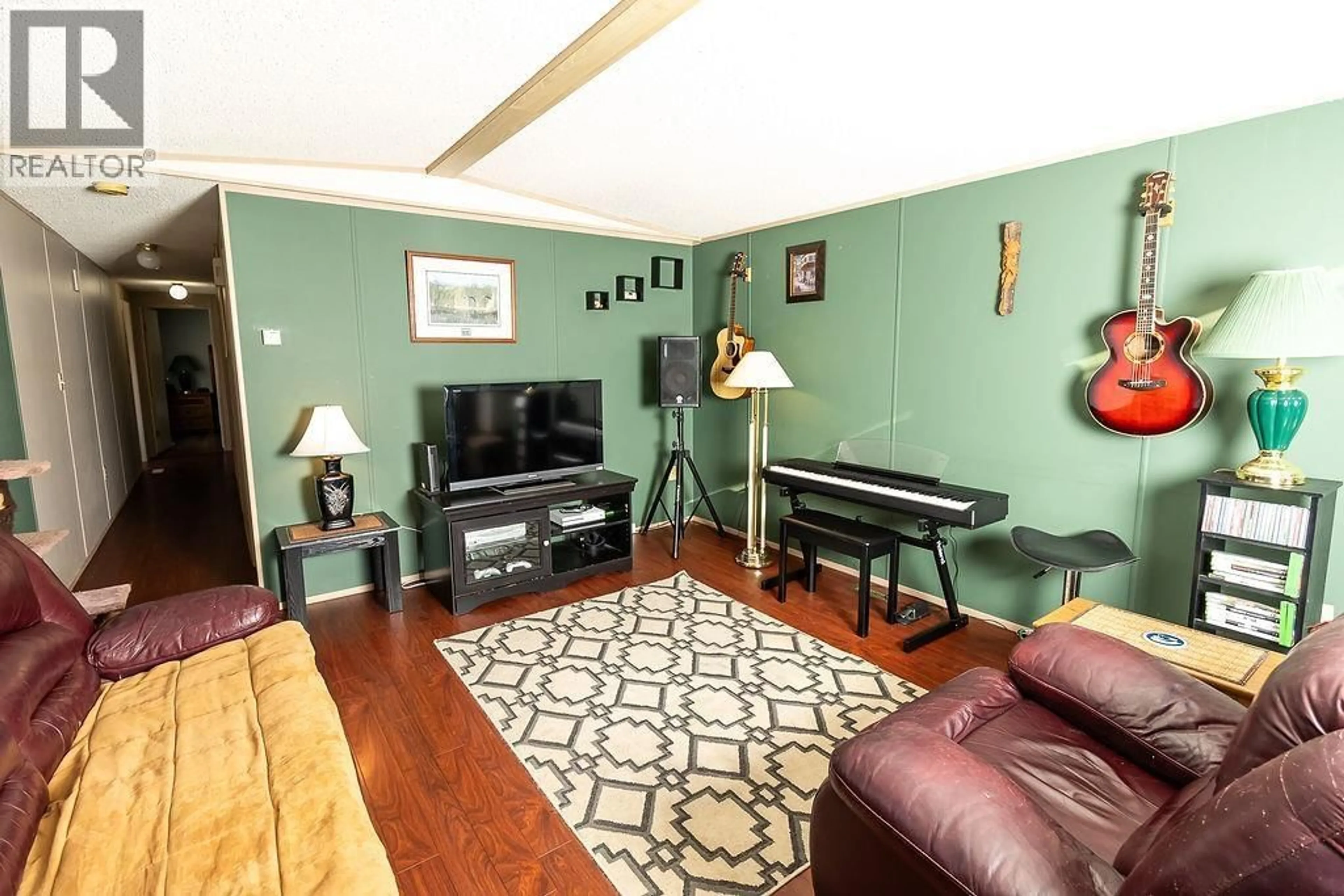 Living room with furniture, wood/laminate floor for 6 - 4305 LAKELSE AVENUE, Terrace British Columbia V8G1N5