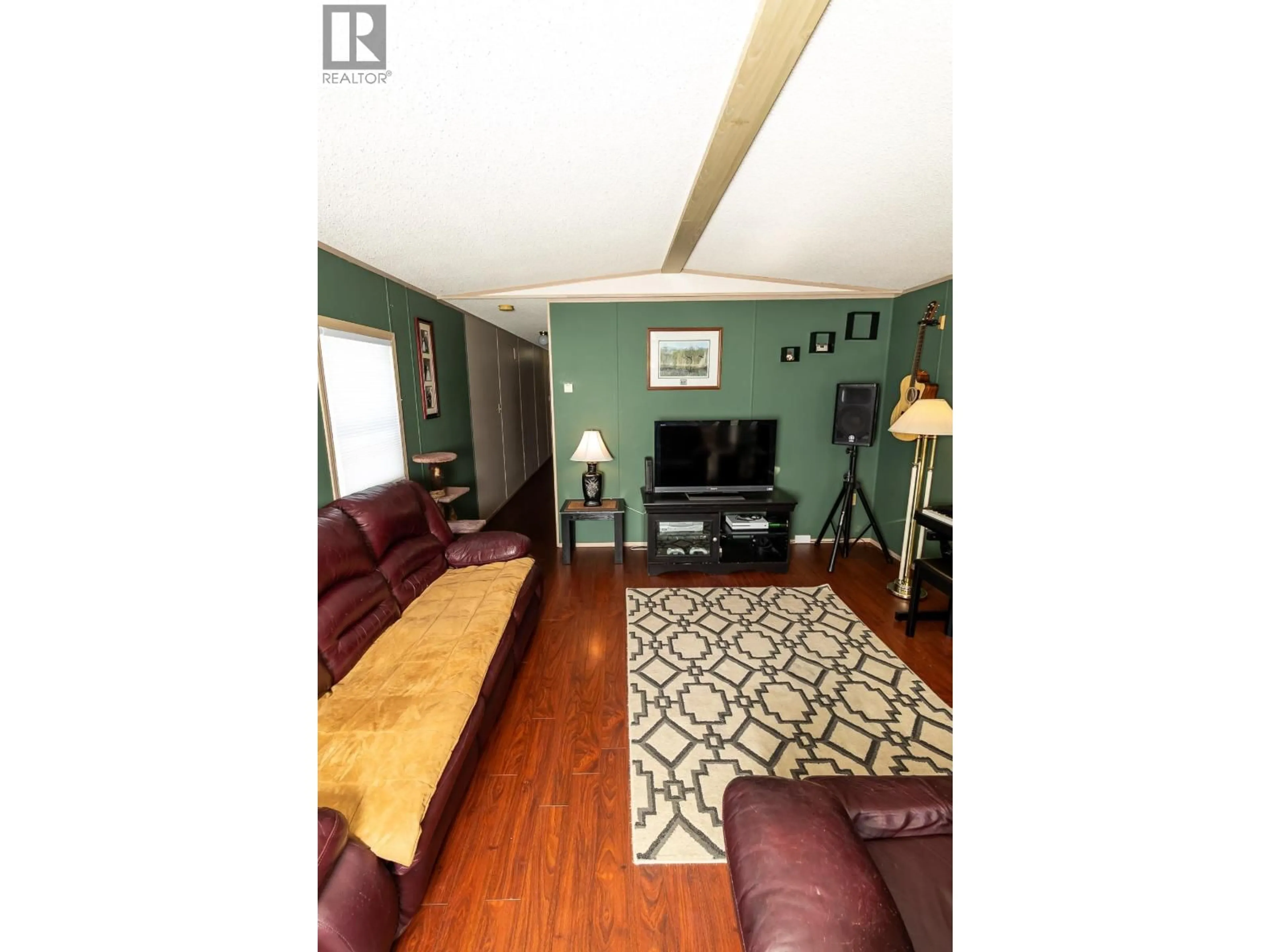 Living room with furniture, wood/laminate floor for 6 - 4305 LAKELSE AVENUE, Terrace British Columbia V8G1N5