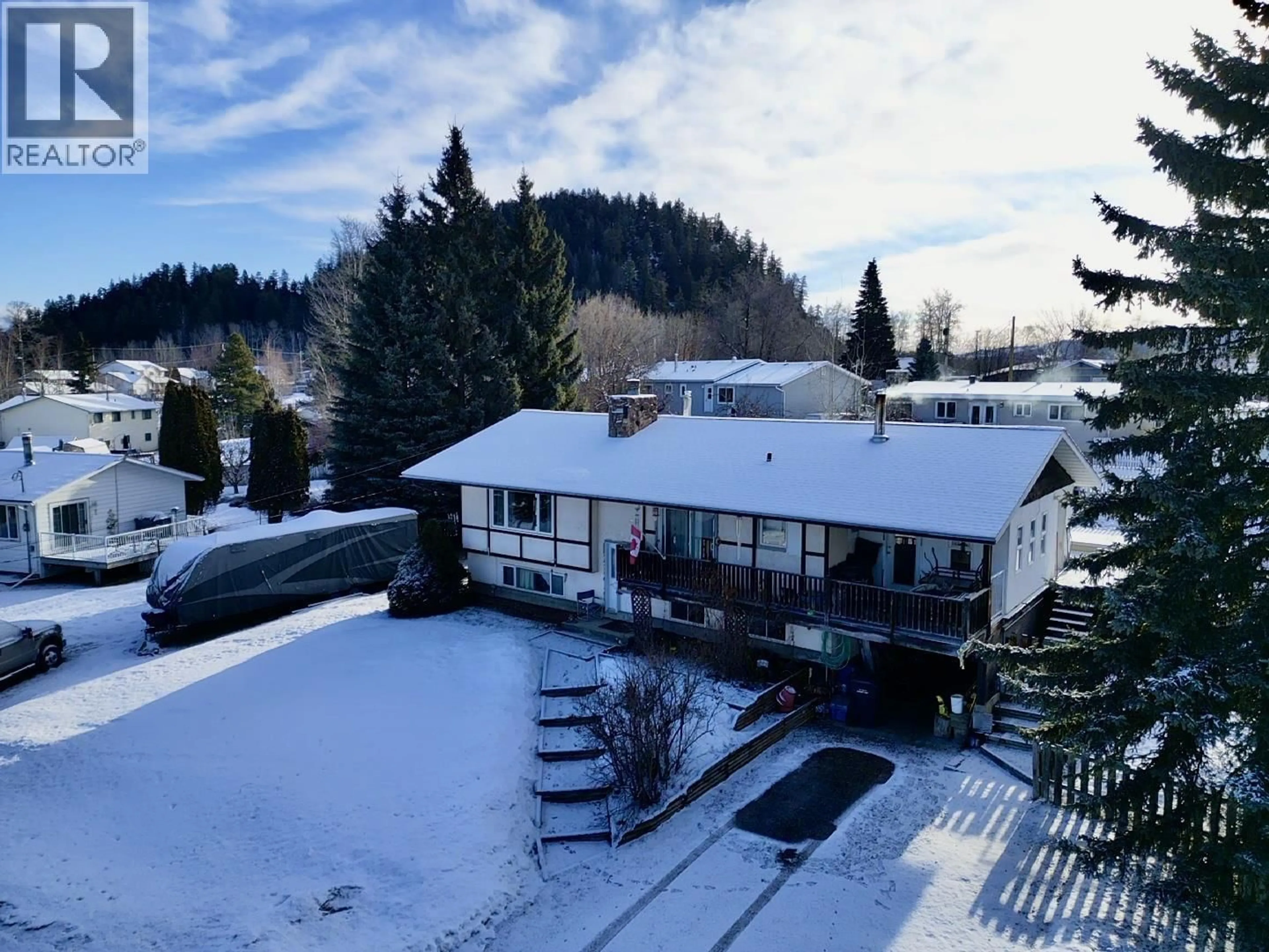 A pic from outside/outdoor area/front of a property/back of a property/a pic from drone, mountain view for 440 SIMON FRASER AVENUE, Fraser Lake British Columbia V0J1S0