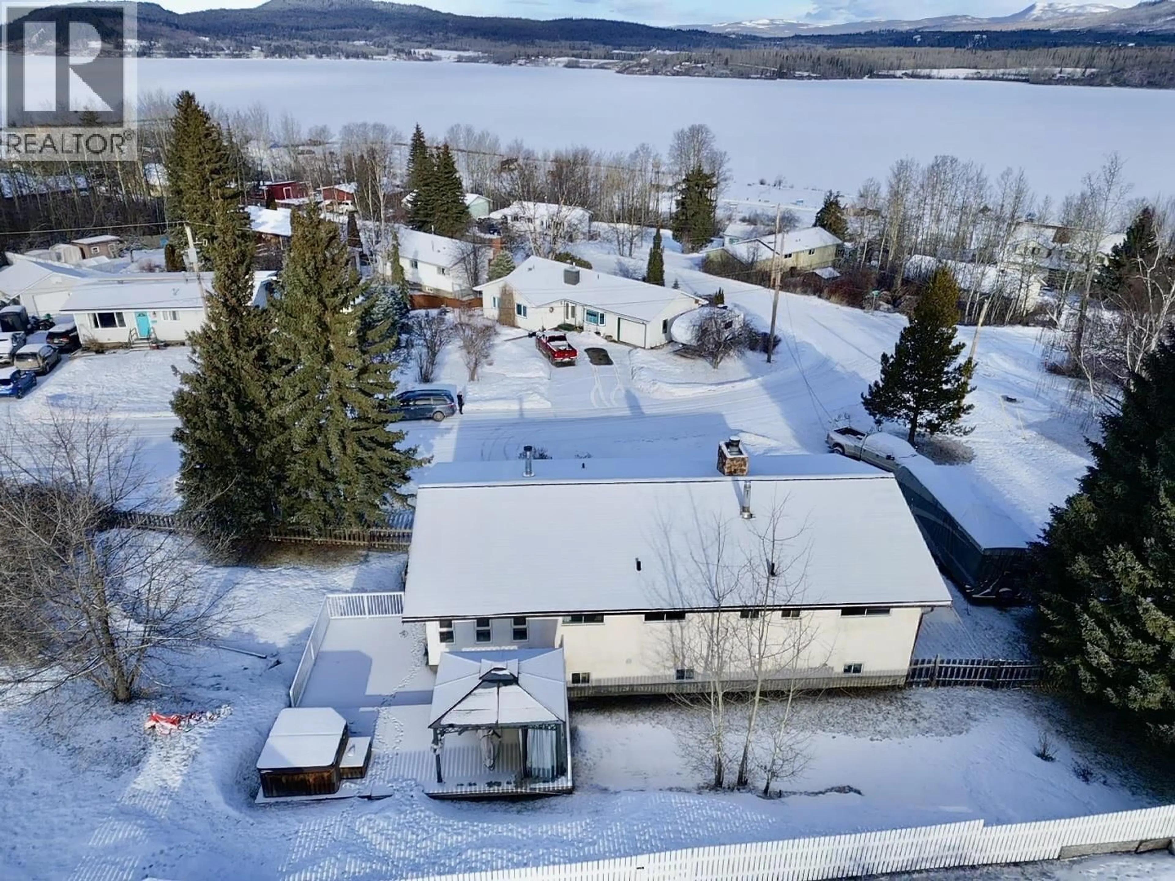 A pic from outside/outdoor area/front of a property/back of a property/a pic from drone, mountain view for 440 SIMON FRASER AVENUE, Fraser Lake British Columbia V0J1S0