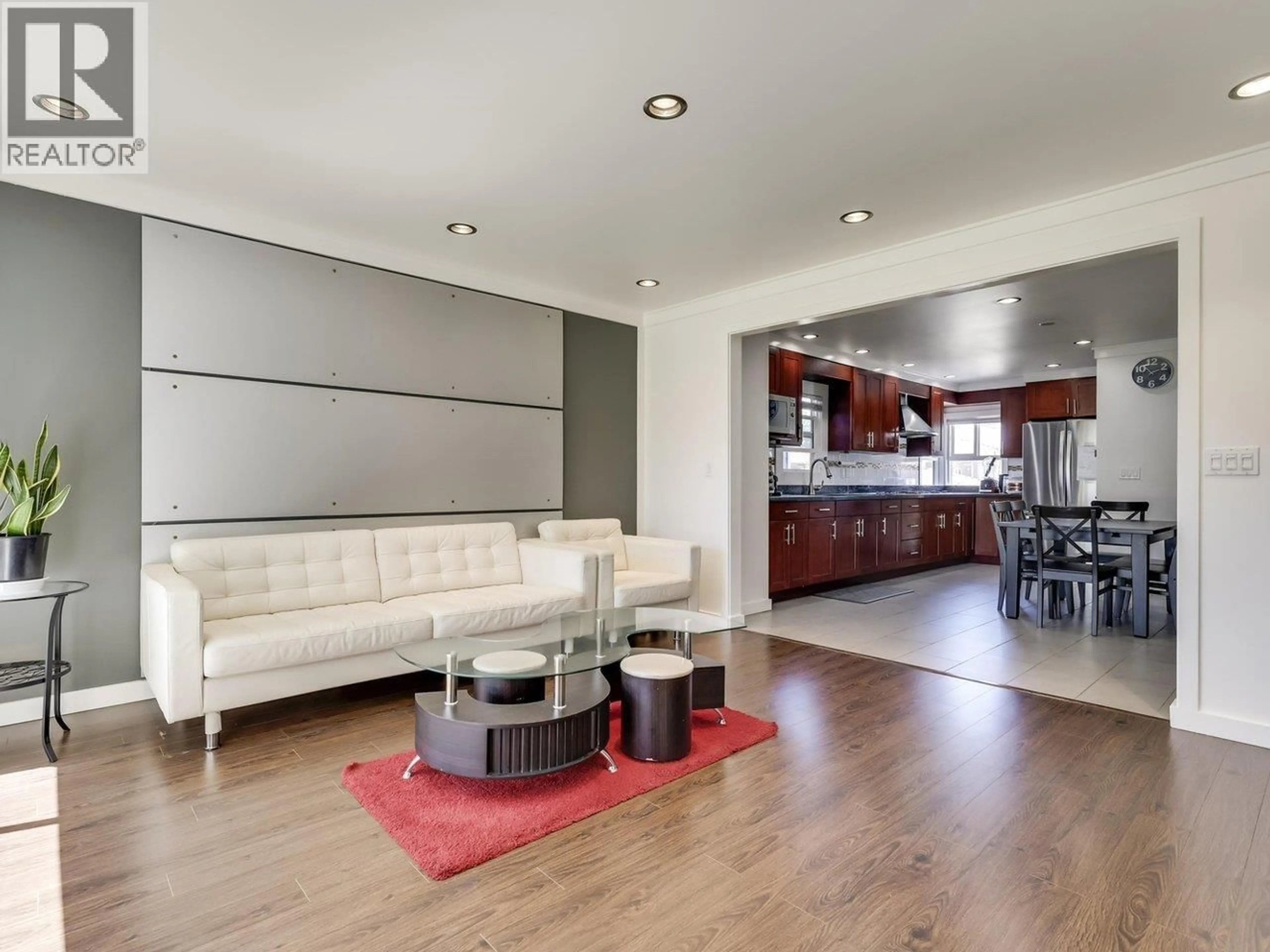 Living room with furniture, wood/laminate floor for 2241 43RD AVENUE, Vancouver British Columbia V5P1M8