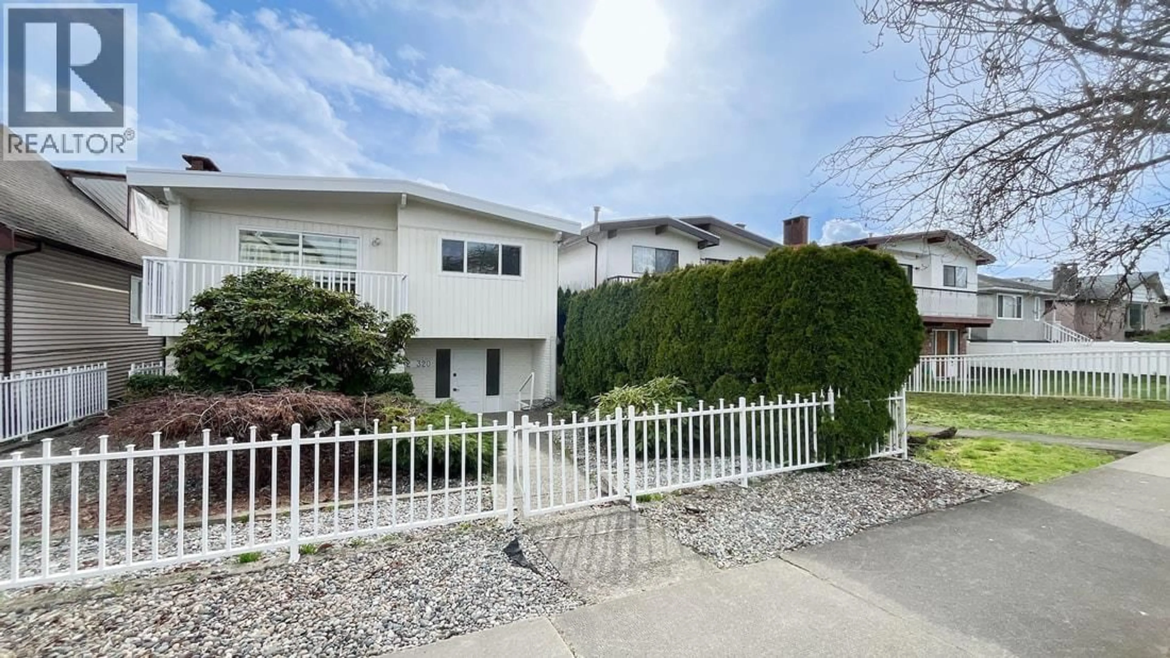 Home with vinyl exterior material, street for 320 57TH AVENUE, Vancouver British Columbia V5X1S7