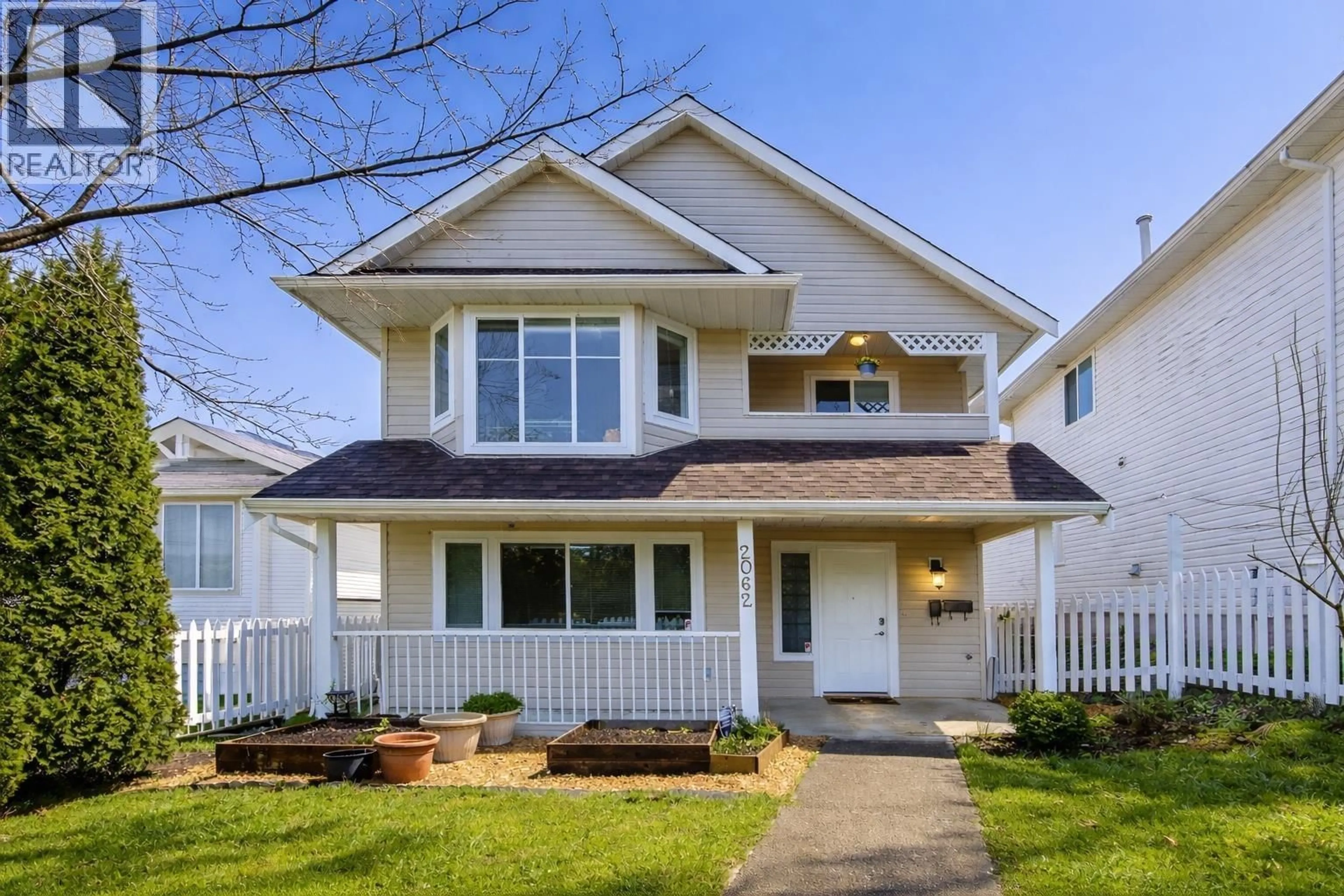 Home with vinyl exterior material, street for 2062 MARY HILL ROAD, Port Coquitlam British Columbia V3C2Z8