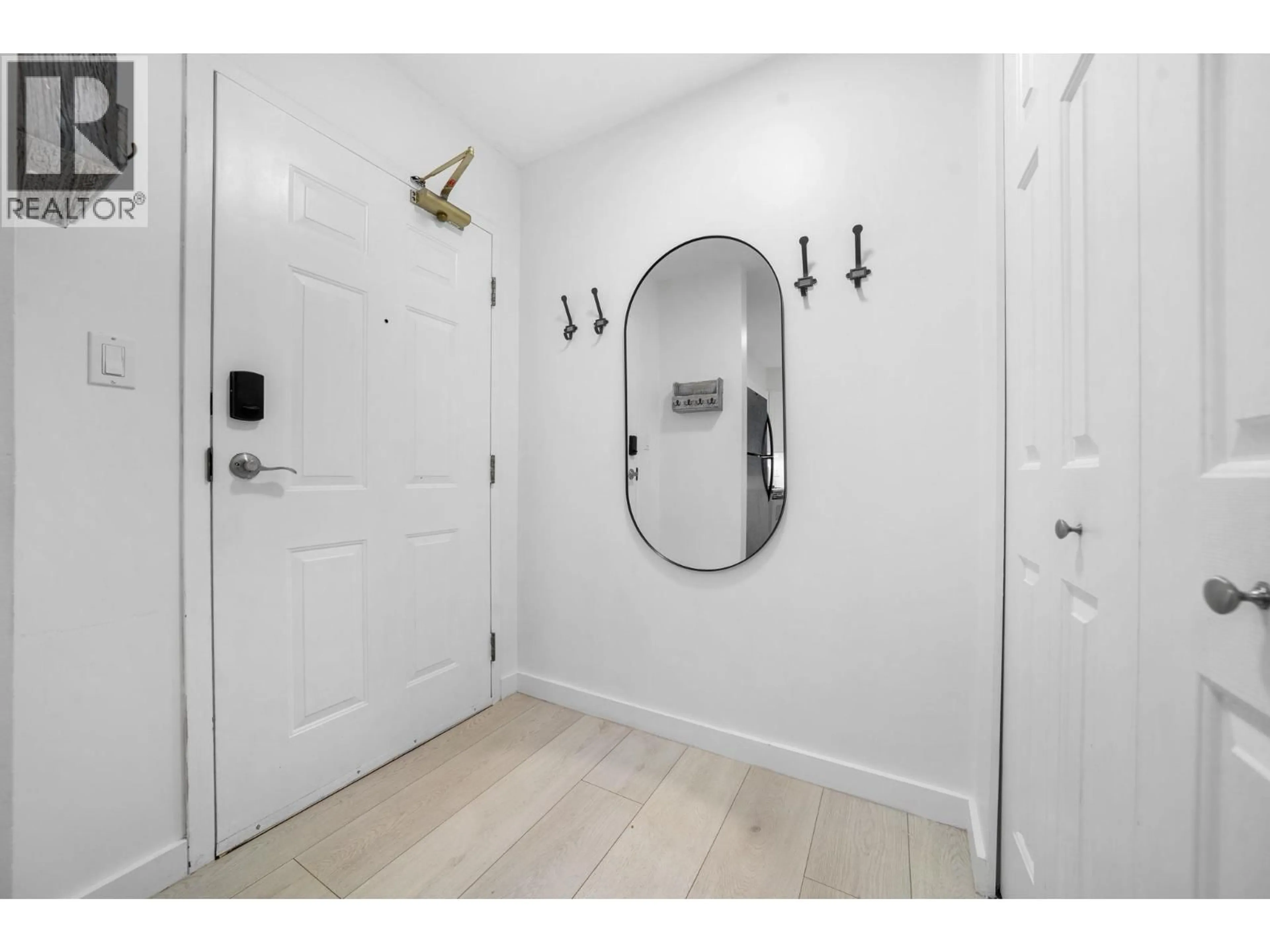 Indoor entryway for 215 - 3600 WINDCREST DRIVE, North Vancouver British Columbia V7G2S5