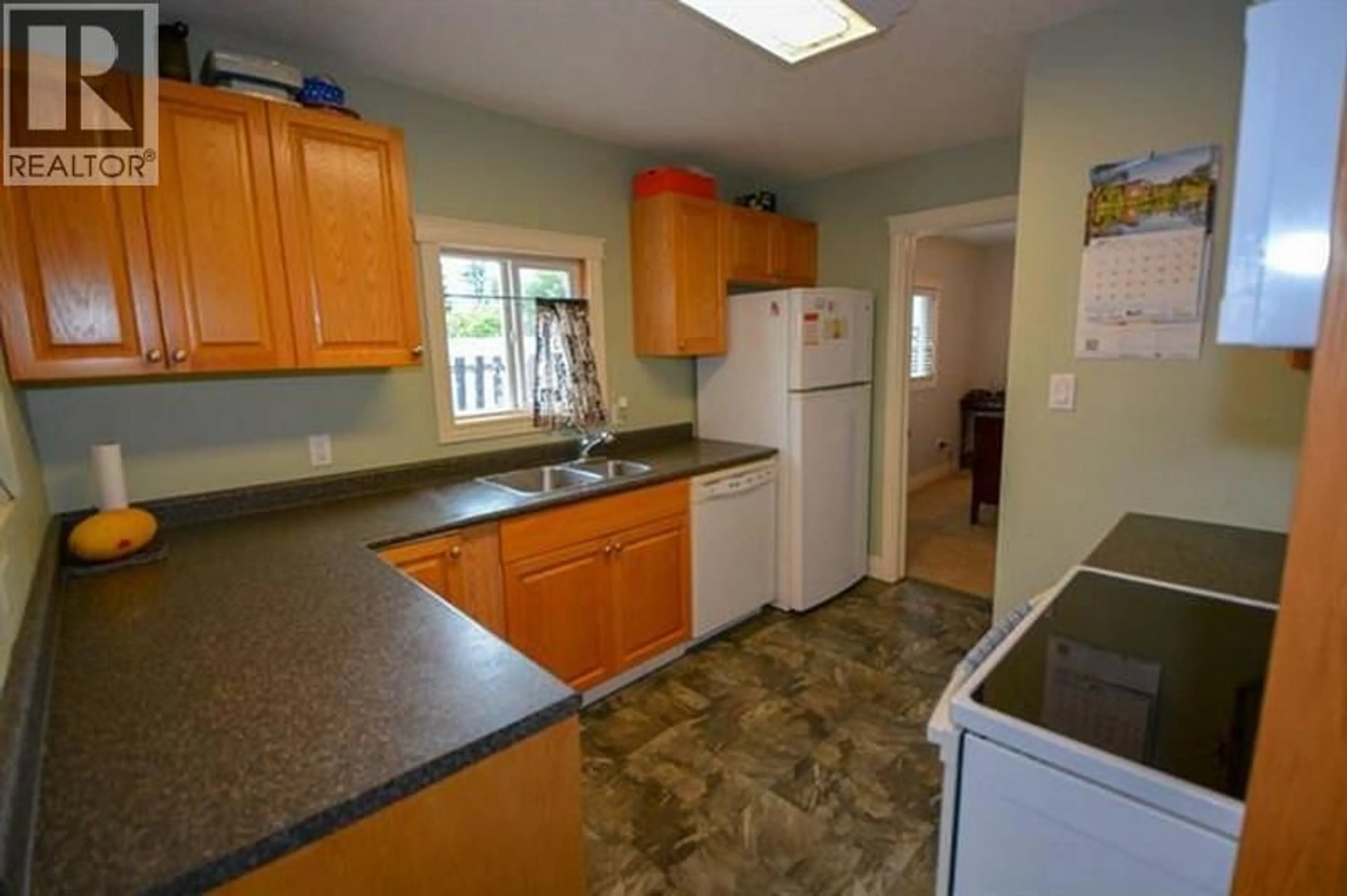 Standard kitchen, ceramic/tile floor for 9223 106 AVENUE, Fort St. John British Columbia V1J2N5