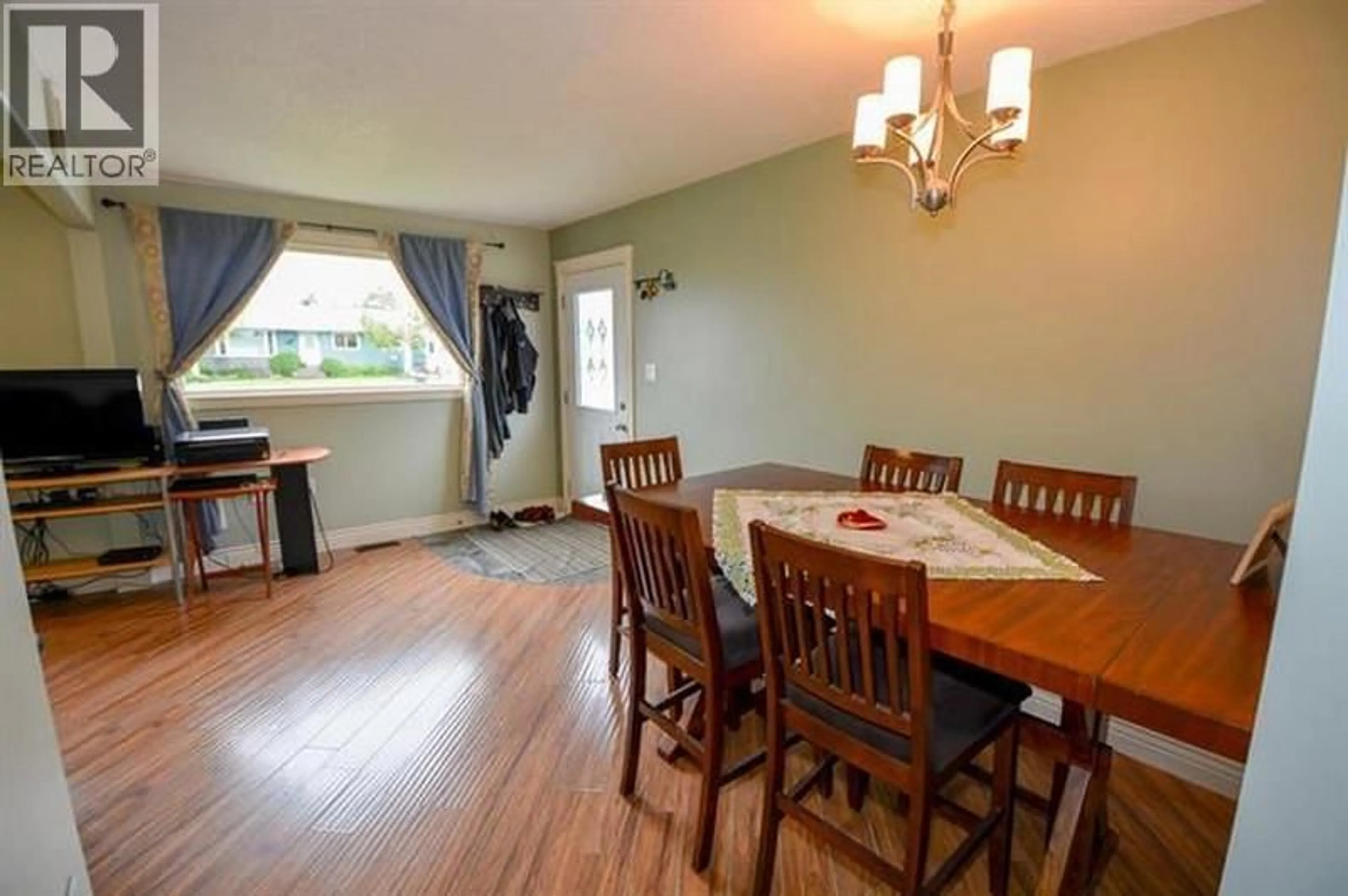 Dining room, wood/laminate floor for 9223 106 AVENUE, Fort St. John British Columbia V1J2N5