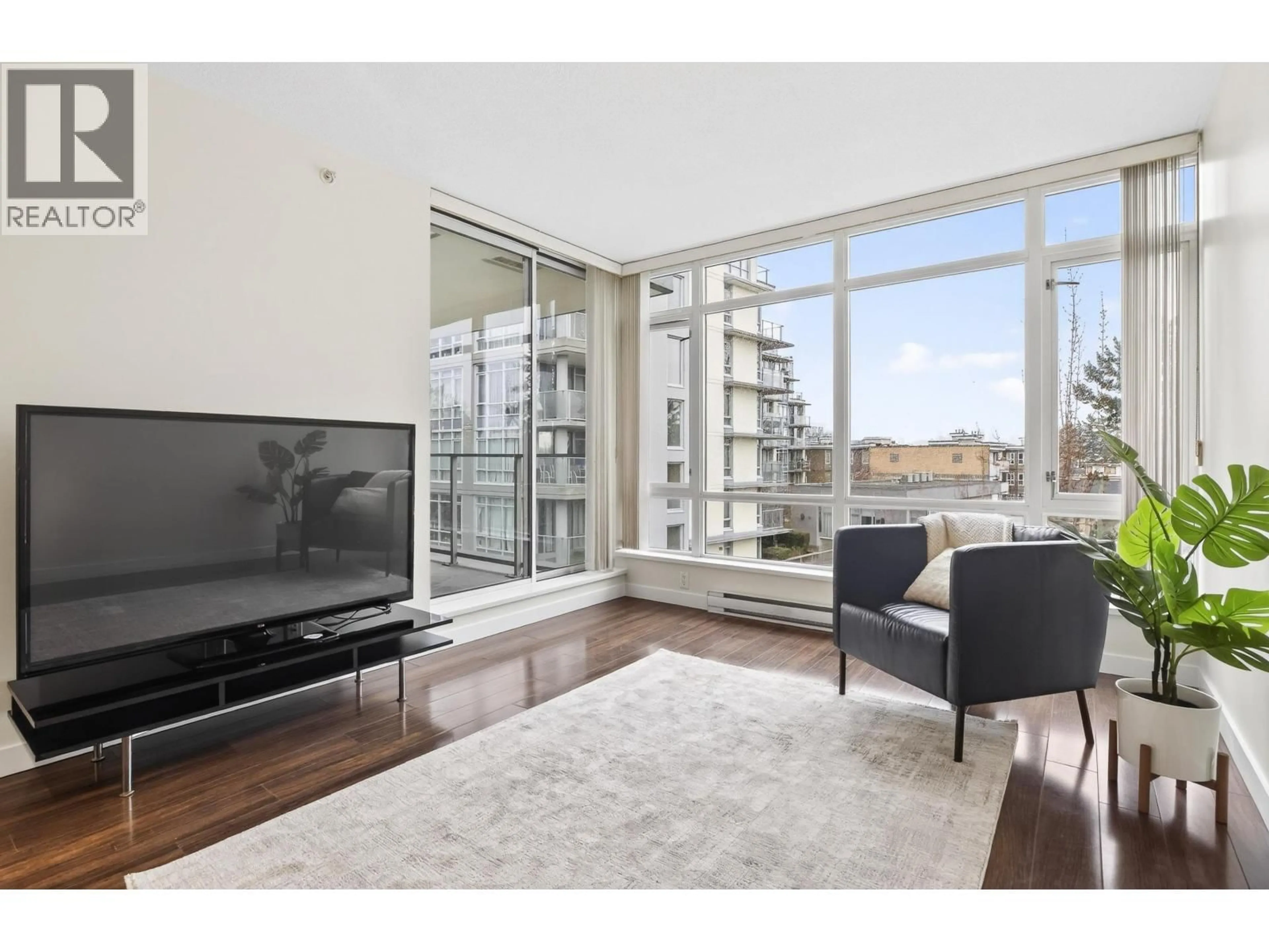 Living room with furniture, unknown for 804 - 4888 NANAIMO STREET, Vancouver British Columbia V5N0B5