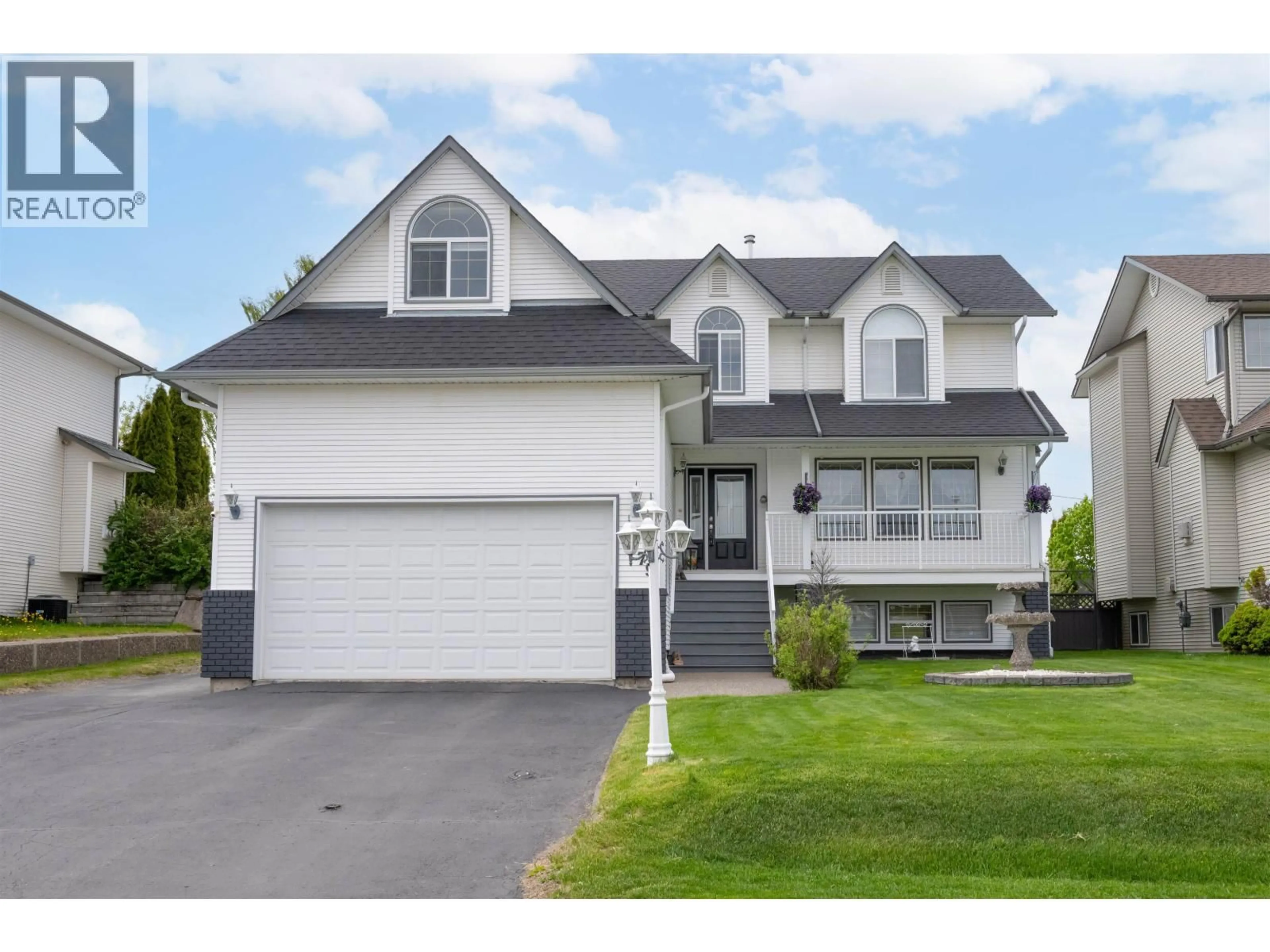 Home with vinyl exterior material, street for 6879 WESTMOUNT DRIVE, Prince George British Columbia V2N6R5