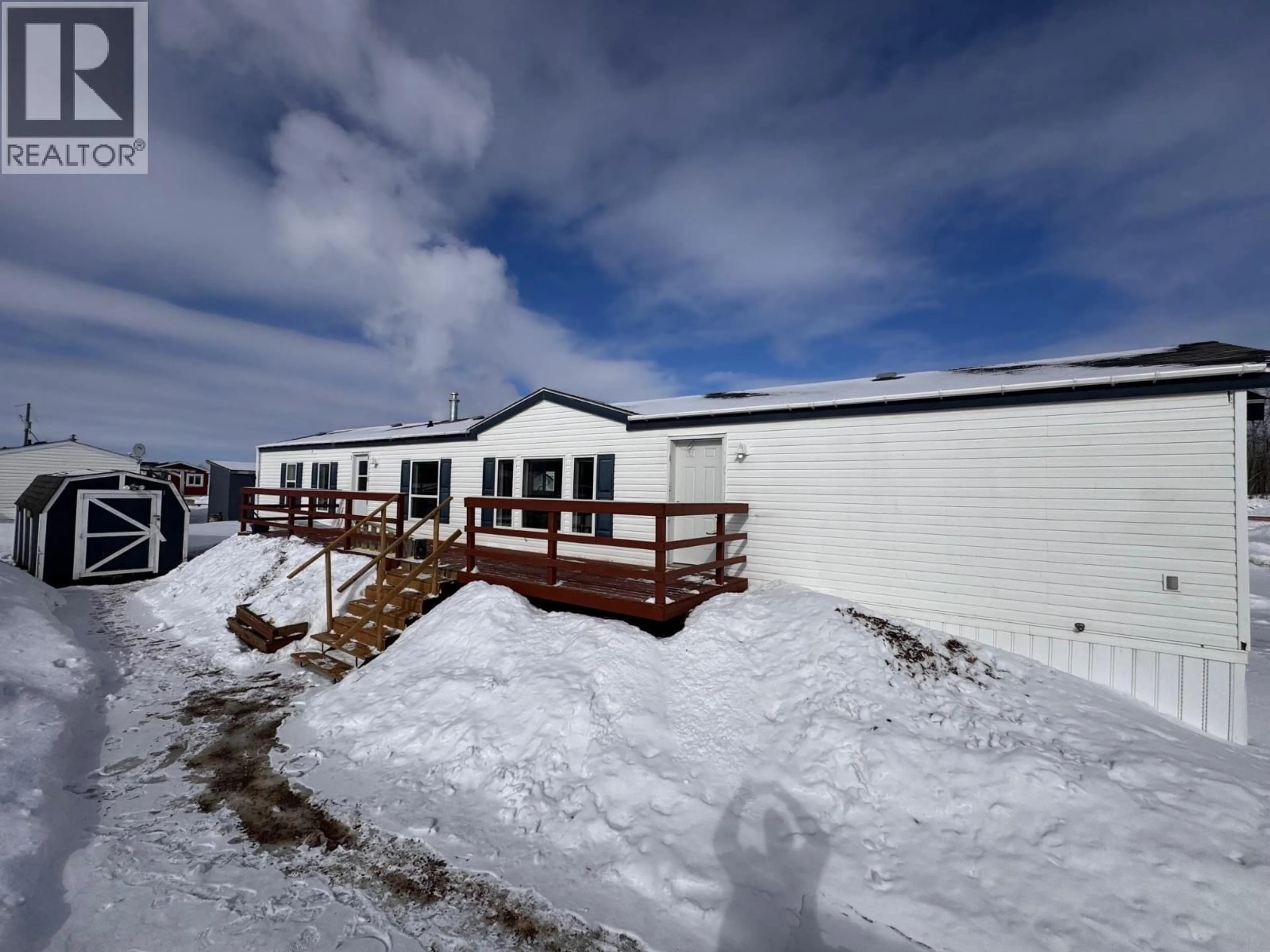 A pic from outside/outdoor area/front of a property/back of a property/a pic from drone, building for 57 - 7414 FOREST LAWN STREET, Fort St. John British Columbia V1J8B7