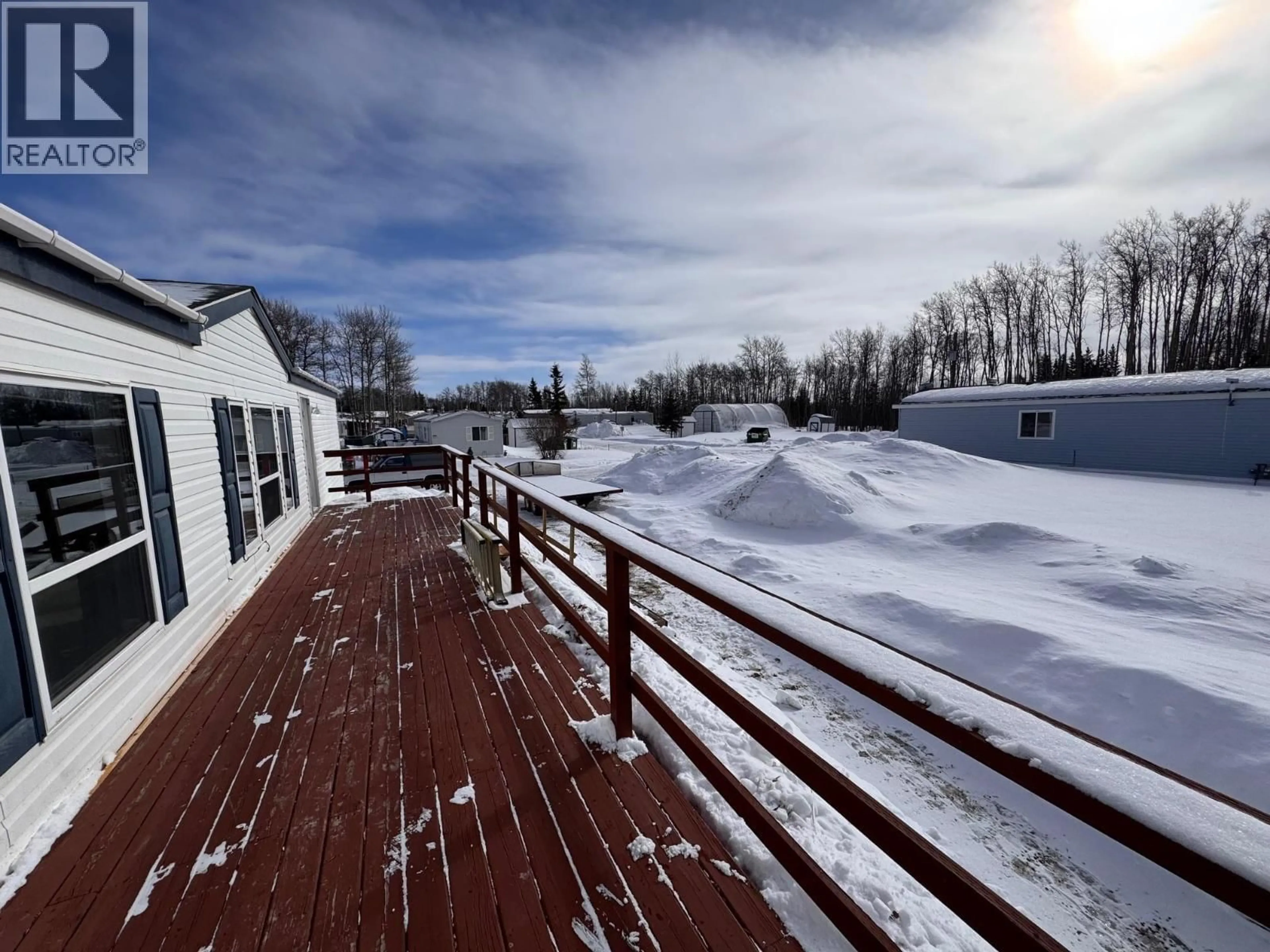 A pic from outside/outdoor area/front of a property/back of a property/a pic from drone, mountain view for 57 - 7414 FOREST LAWN STREET, Fort St. John British Columbia V1J8B7