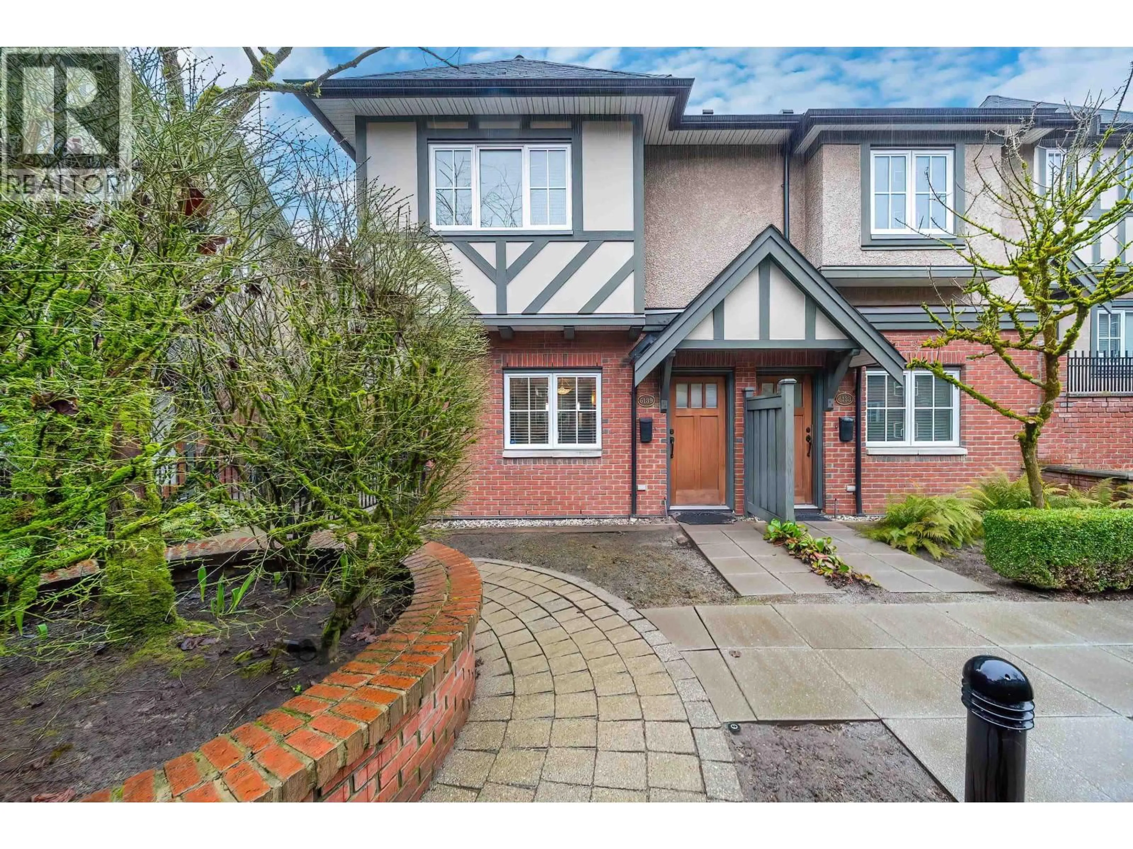 Home with brick exterior material, street for 6139 OAK STREET, Vancouver British Columbia V6M2W3