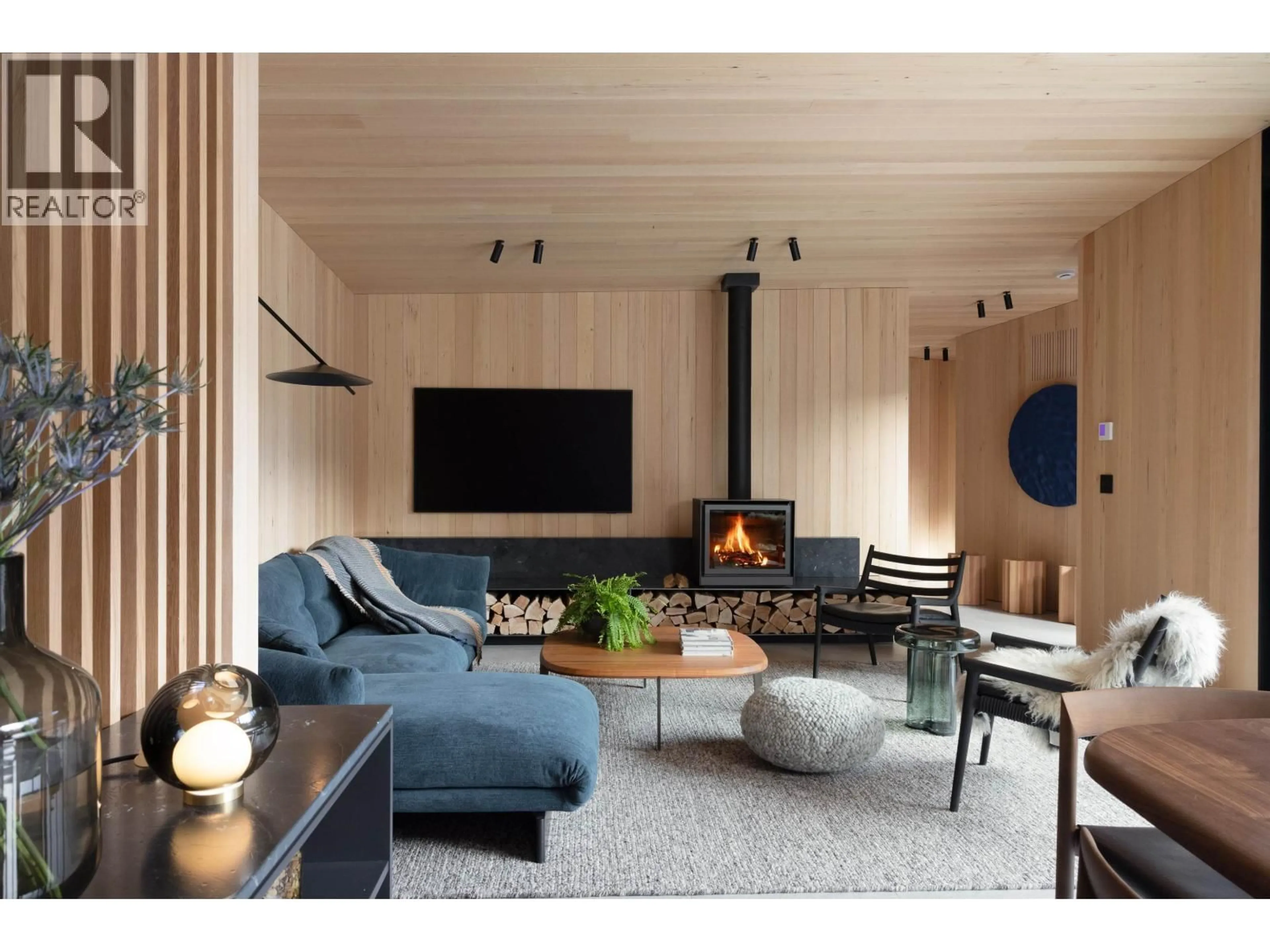 Living room with furniture, wood/laminate floor for 7501 AMBASSADOR CRESCENT, Whistler British Columbia V8E0E5