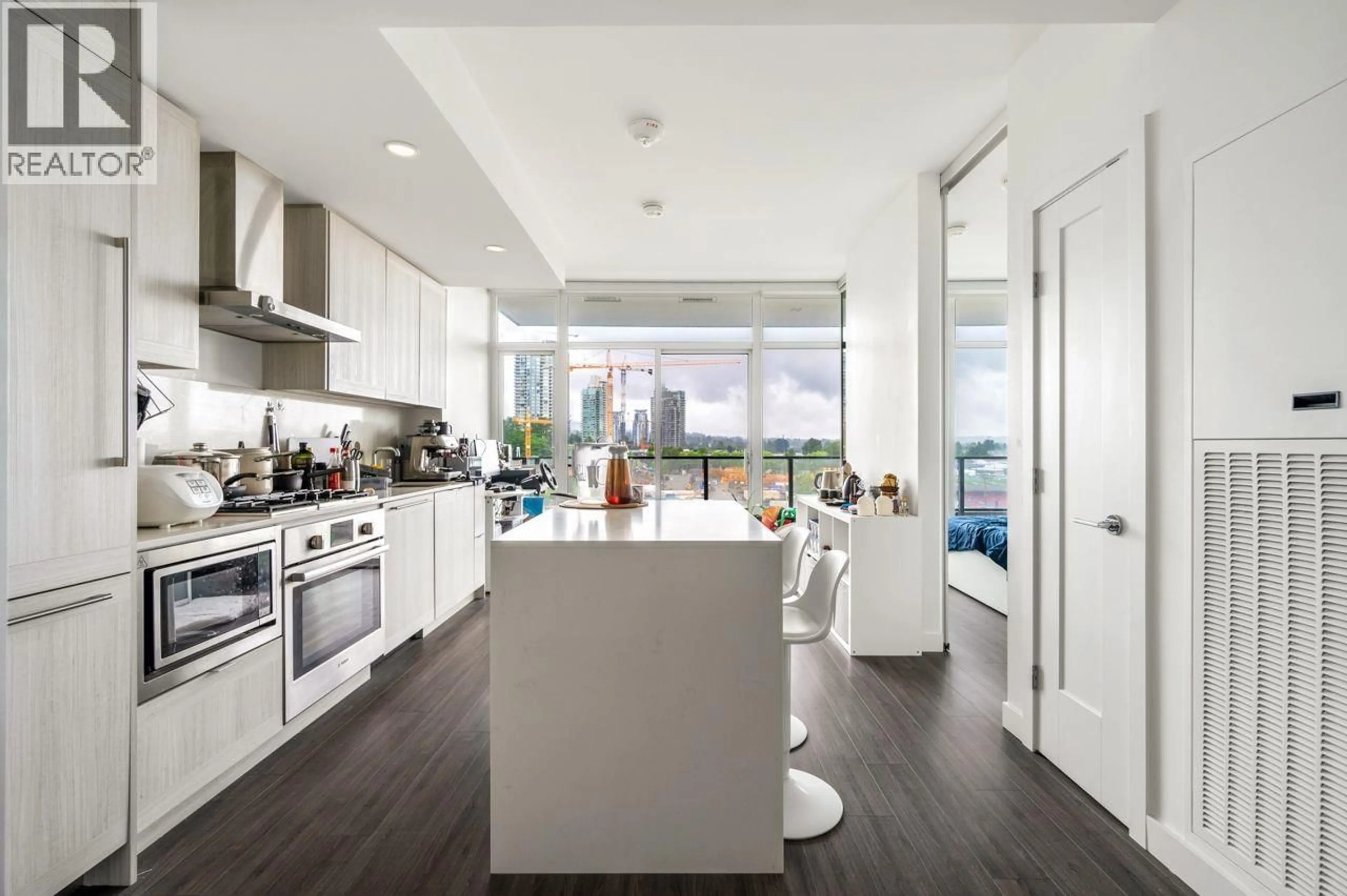 Contemporary kitchen, ceramic/tile floor for 603 - 2351 BETA AVENUE, Burnaby British Columbia V5C0M2