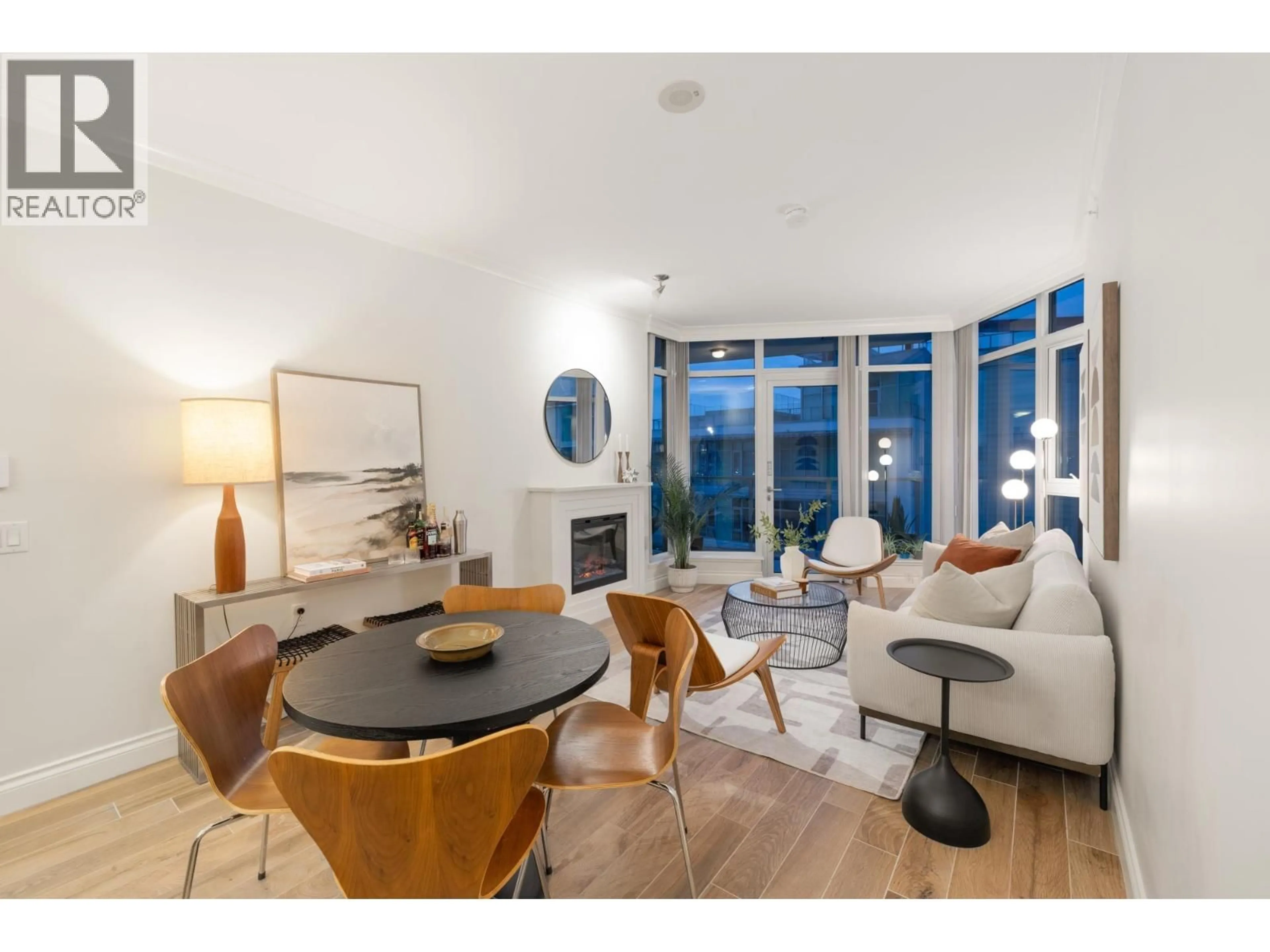 Living room with furniture, unknown for 803 - 199 VICTORY SHIP WAY, North Vancouver British Columbia V7L0E2