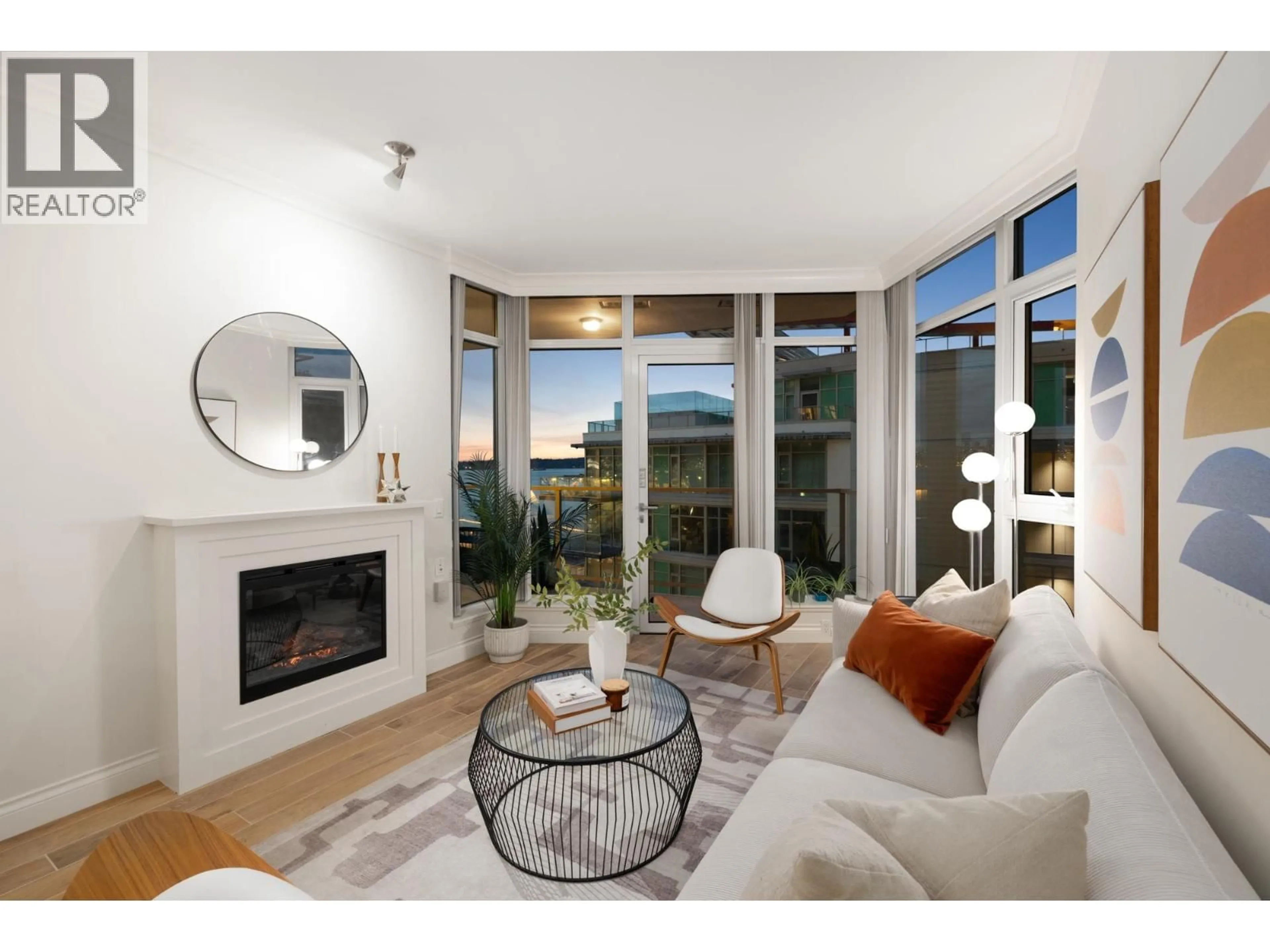 Living room with furniture, unknown for 803 - 199 VICTORY SHIP WAY, North Vancouver British Columbia V7L0E2