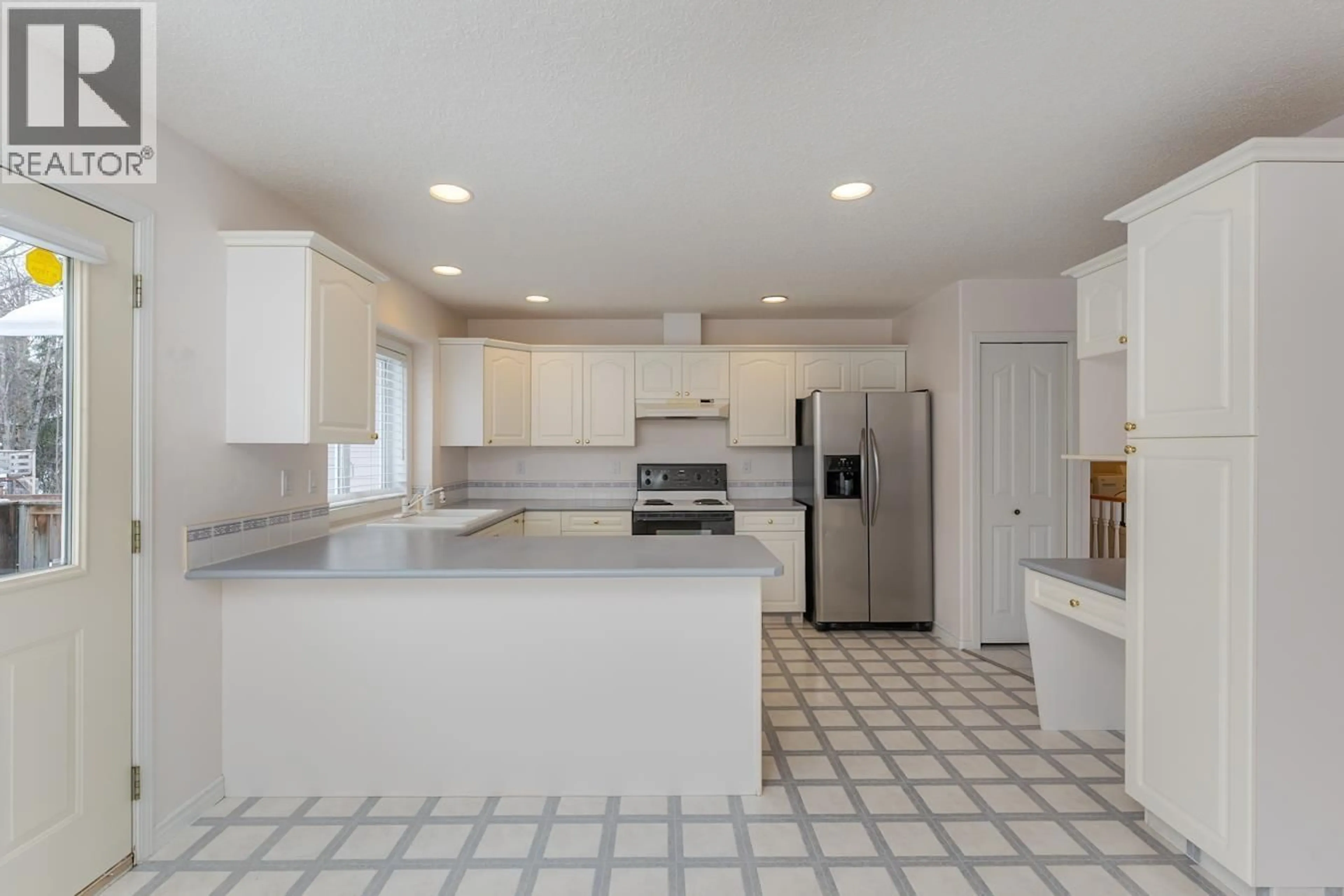 Open concept kitchen, ceramic/tile floor for 4311 FOSTER ROAD, Prince George British Columbia V2N5H7