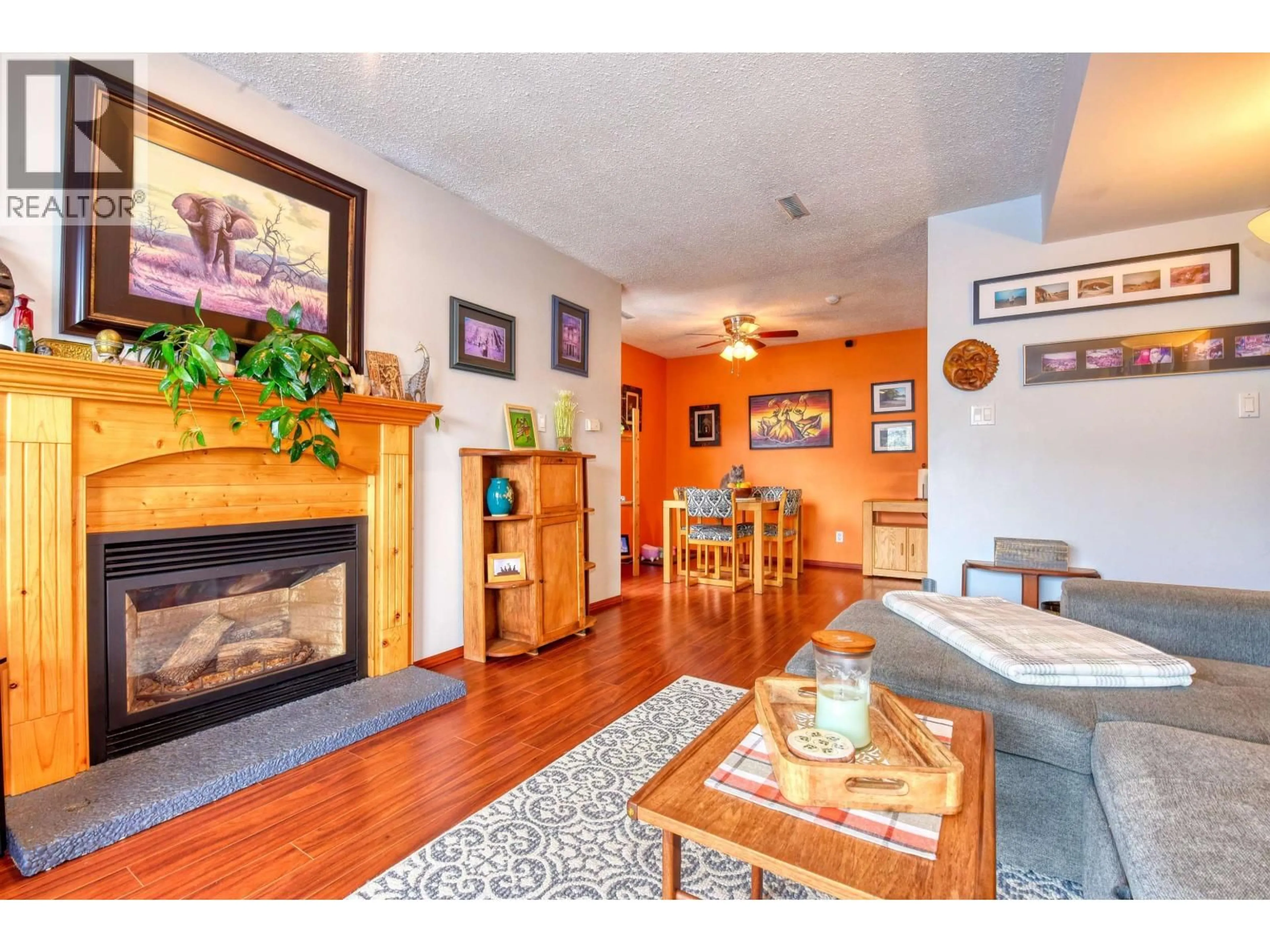 Living room with furniture, wood/laminate floor for 1116 SECOND AVENUE, Williams Lake British Columbia V2G1X8