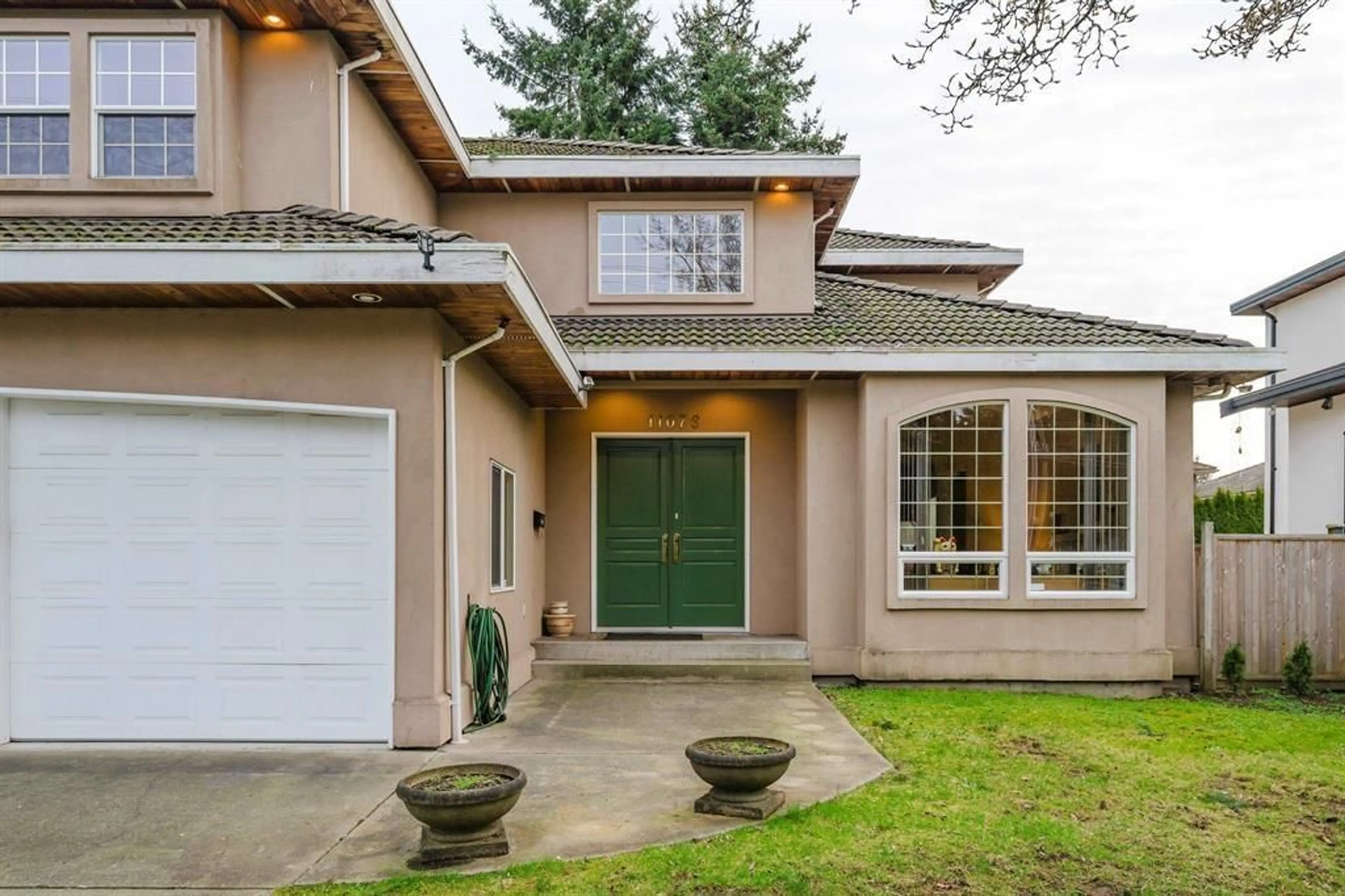 Home with vinyl exterior material, street for 11076 84 AVENUE, Delta British Columbia V4C2L7