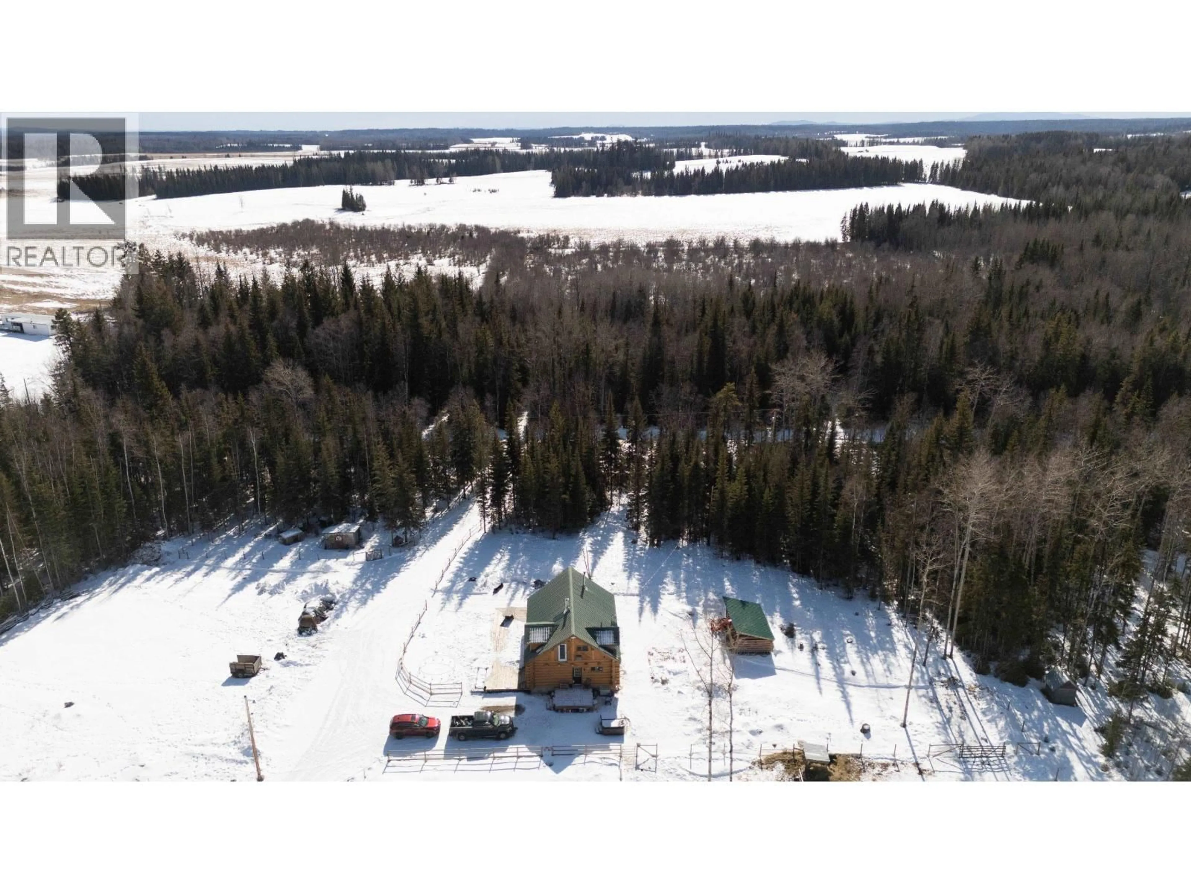 A pic from outside/outdoor area/front of a property/back of a property/a pic from drone, water/lake/river/ocean view for 29070 CHIEF LAKE ROAD, Prince George British Columbia V2K5L3