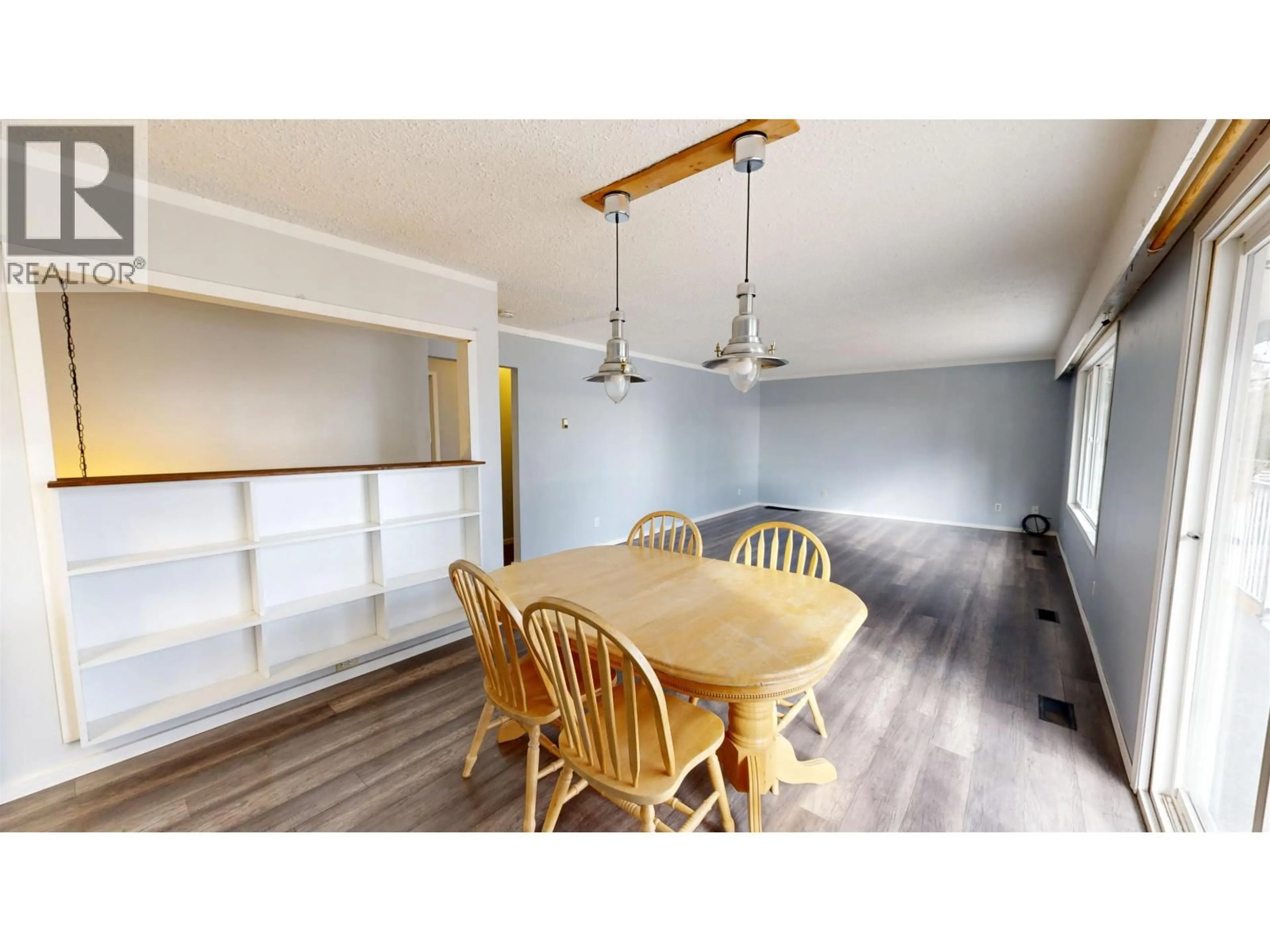 Dining room, wood/laminate floor for 5459 DONSLEEQUA COURT, 108 Mile Ranch British Columbia V0K2Z0