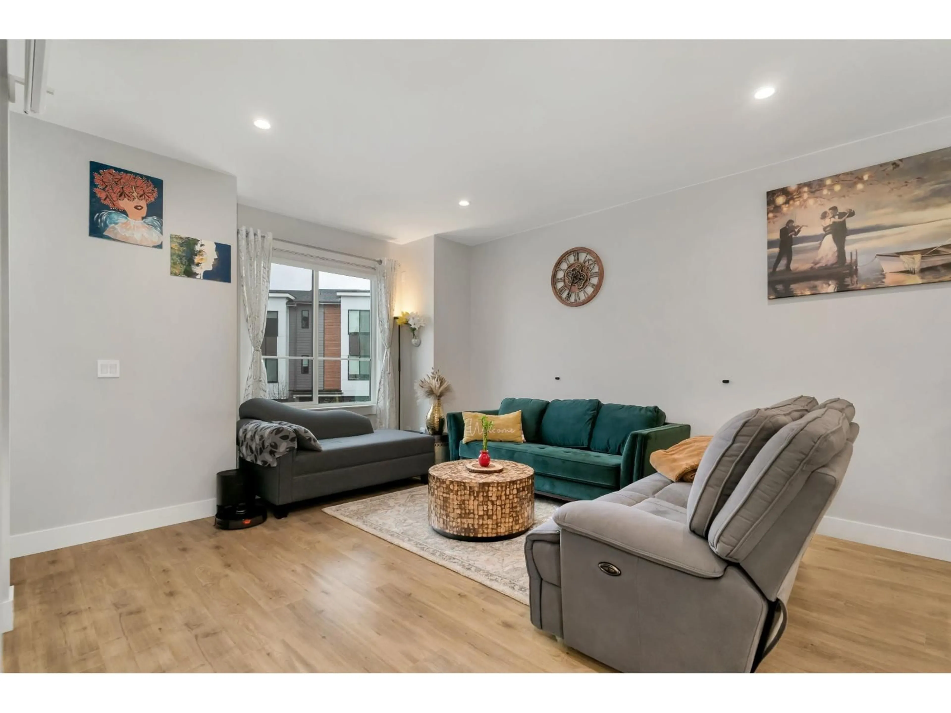 Living room with furniture, wood/laminate floor for 51 - 1639 162 STREET, Surrey British Columbia V4A4Y1