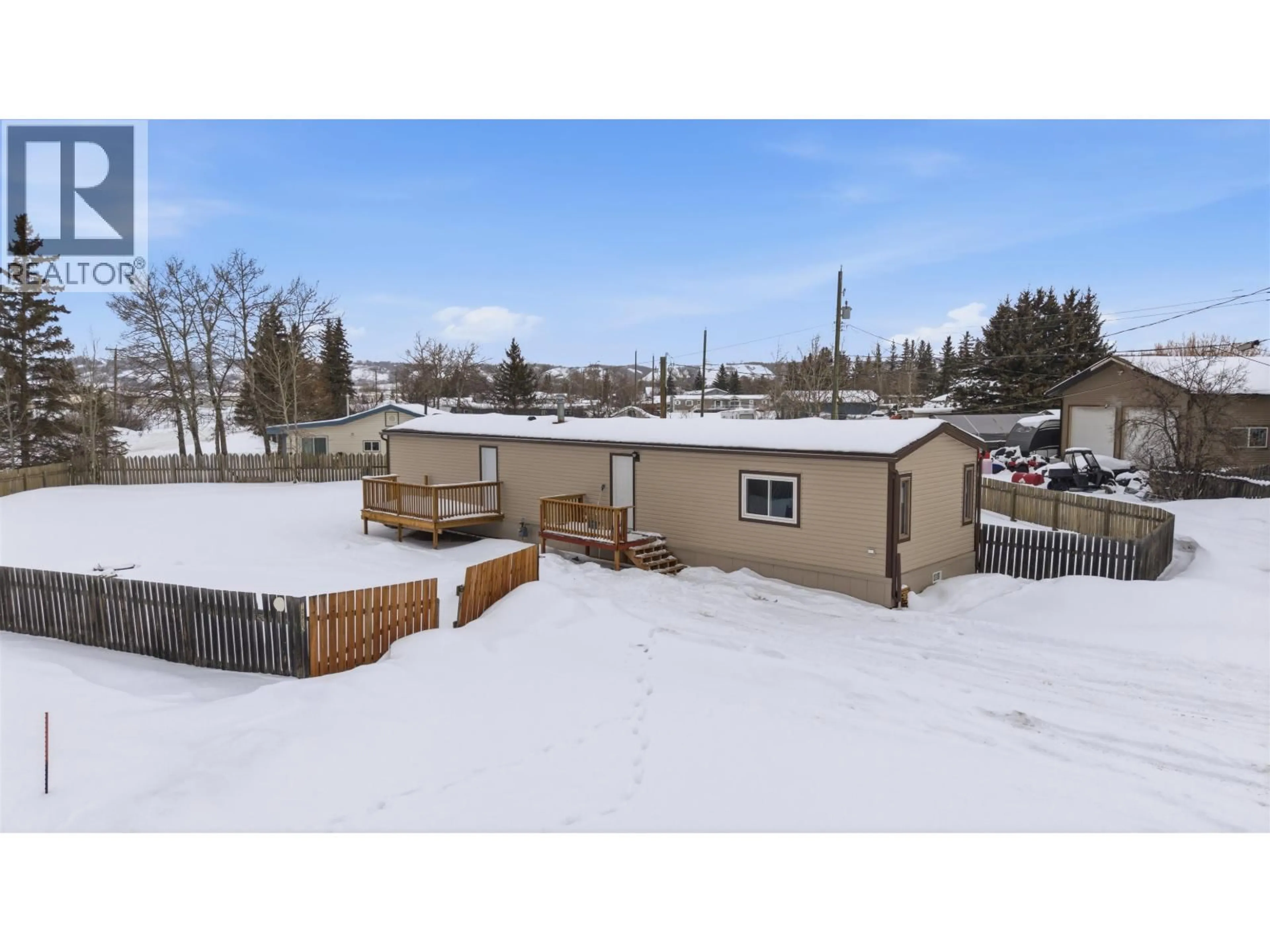 A pic from outside/outdoor area/front of a property/back of a property/a pic from drone, mountain view for 10863 102 STREET, Taylor British Columbia V0C2K0