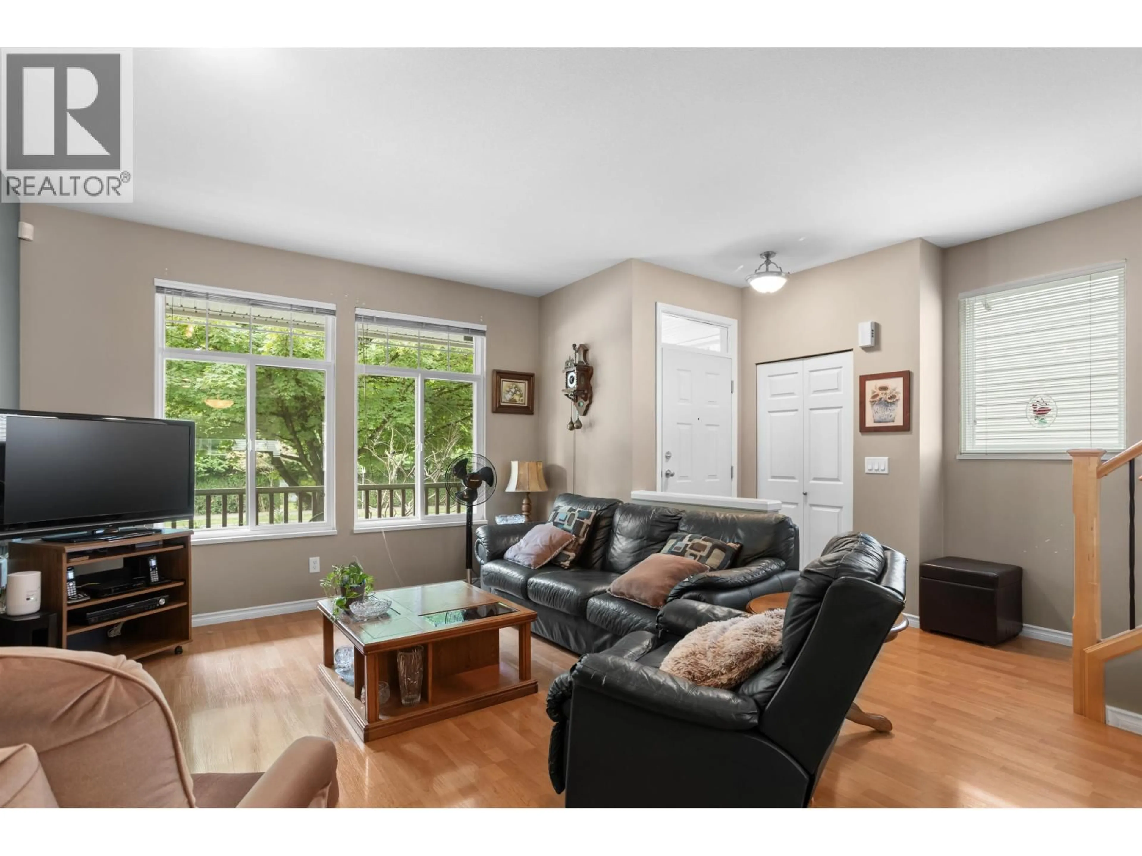 Living room with furniture, wood/laminate floor for 23635 DEWDNEY TRUNK ROAD, Maple Ridge British Columbia V4R2W9