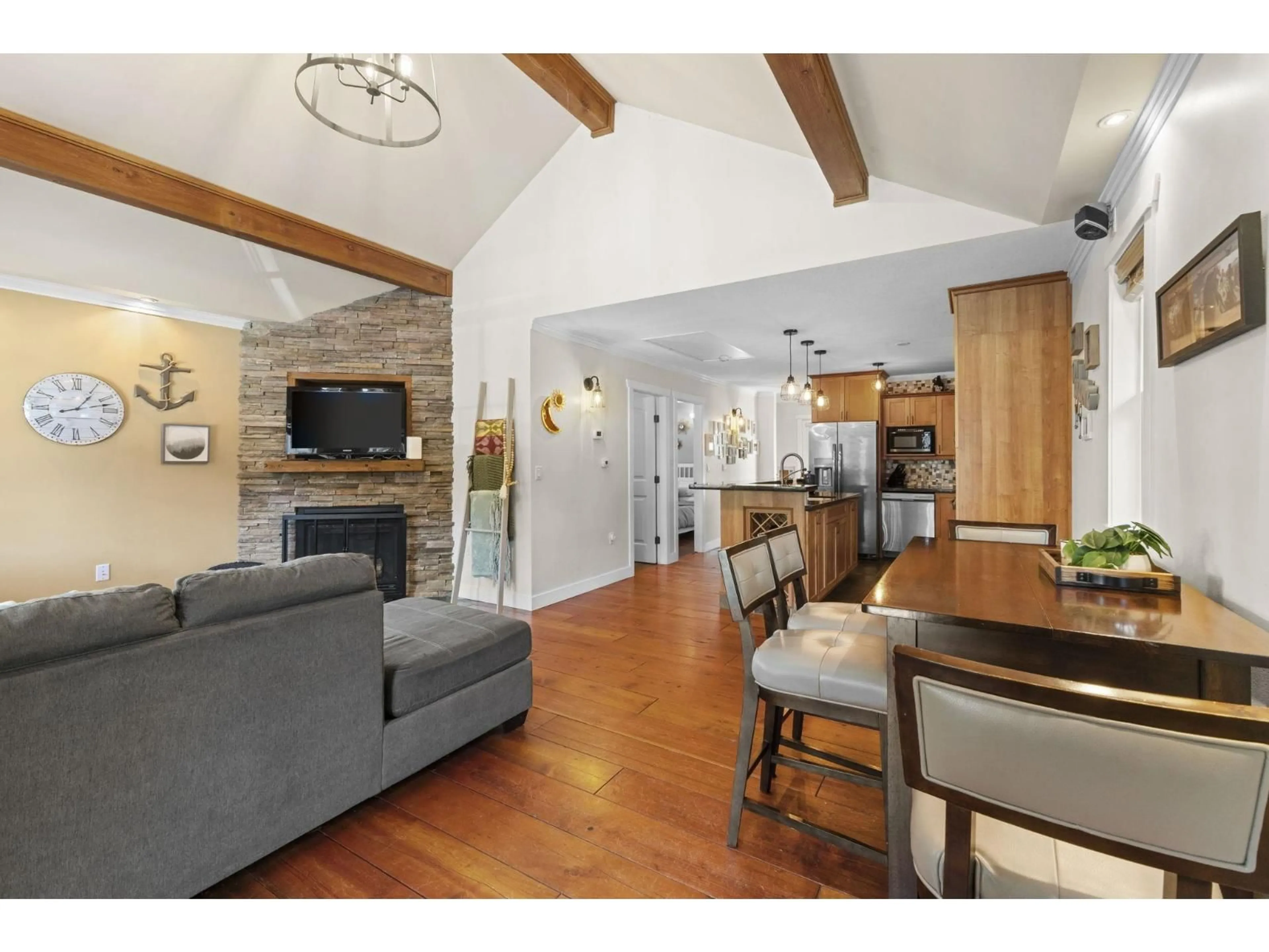 Open concept kitchen, wood/laminate floor for 311 SPRUCE STREET, Cultus Lake British Columbia V2R4Y7