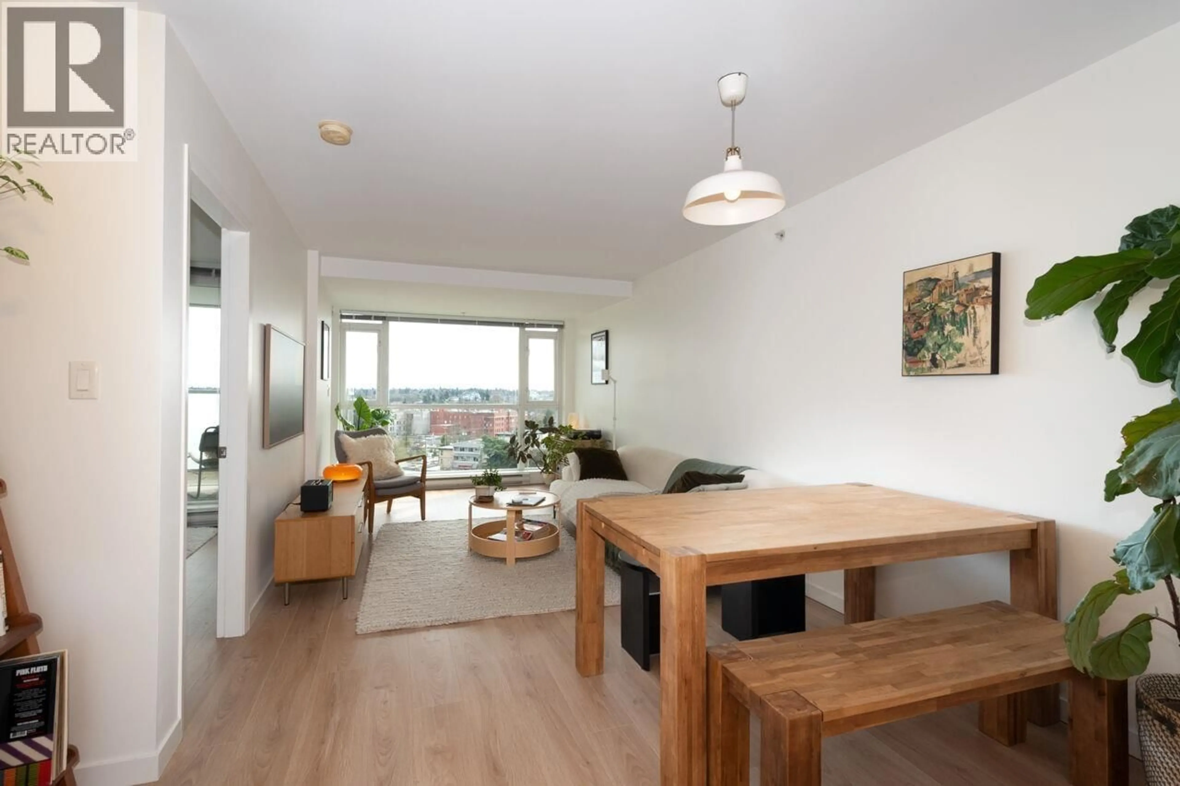 Living room with furniture, wood/laminate floor for 1006 - 2770 SOPHIA STREET, Vancouver British Columbia V5T0A4