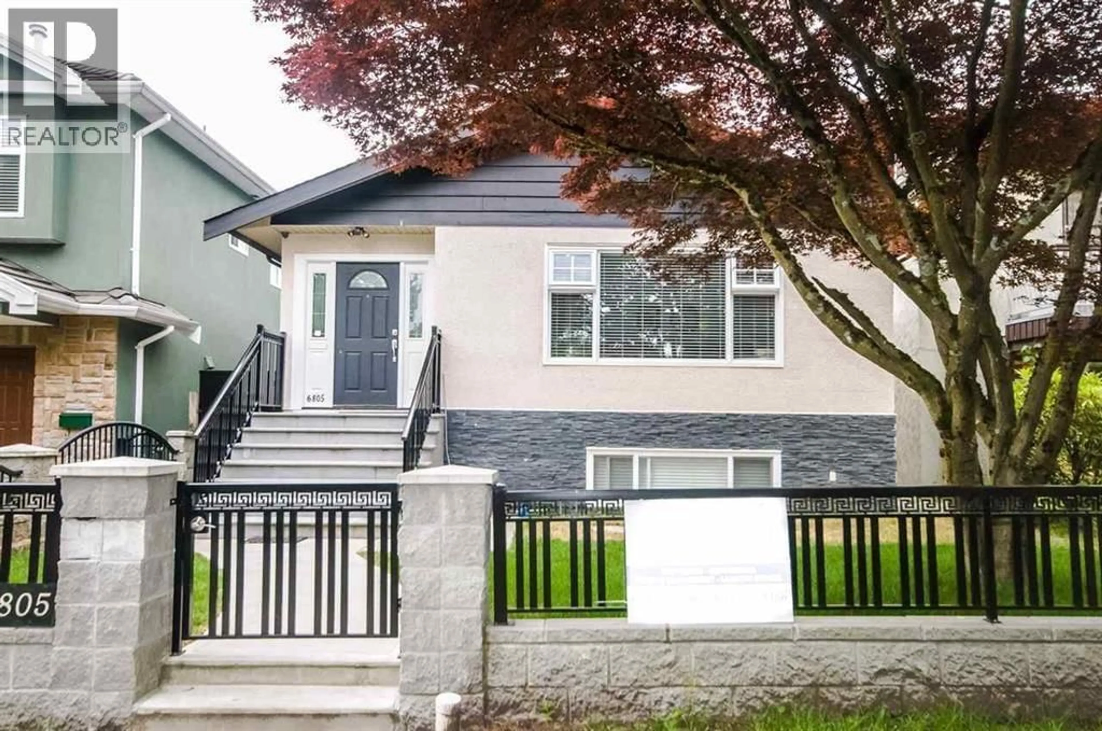 Home with vinyl exterior material, street for 6805 SHERBROOKE STREET, Vancouver British Columbia V5X4C9
