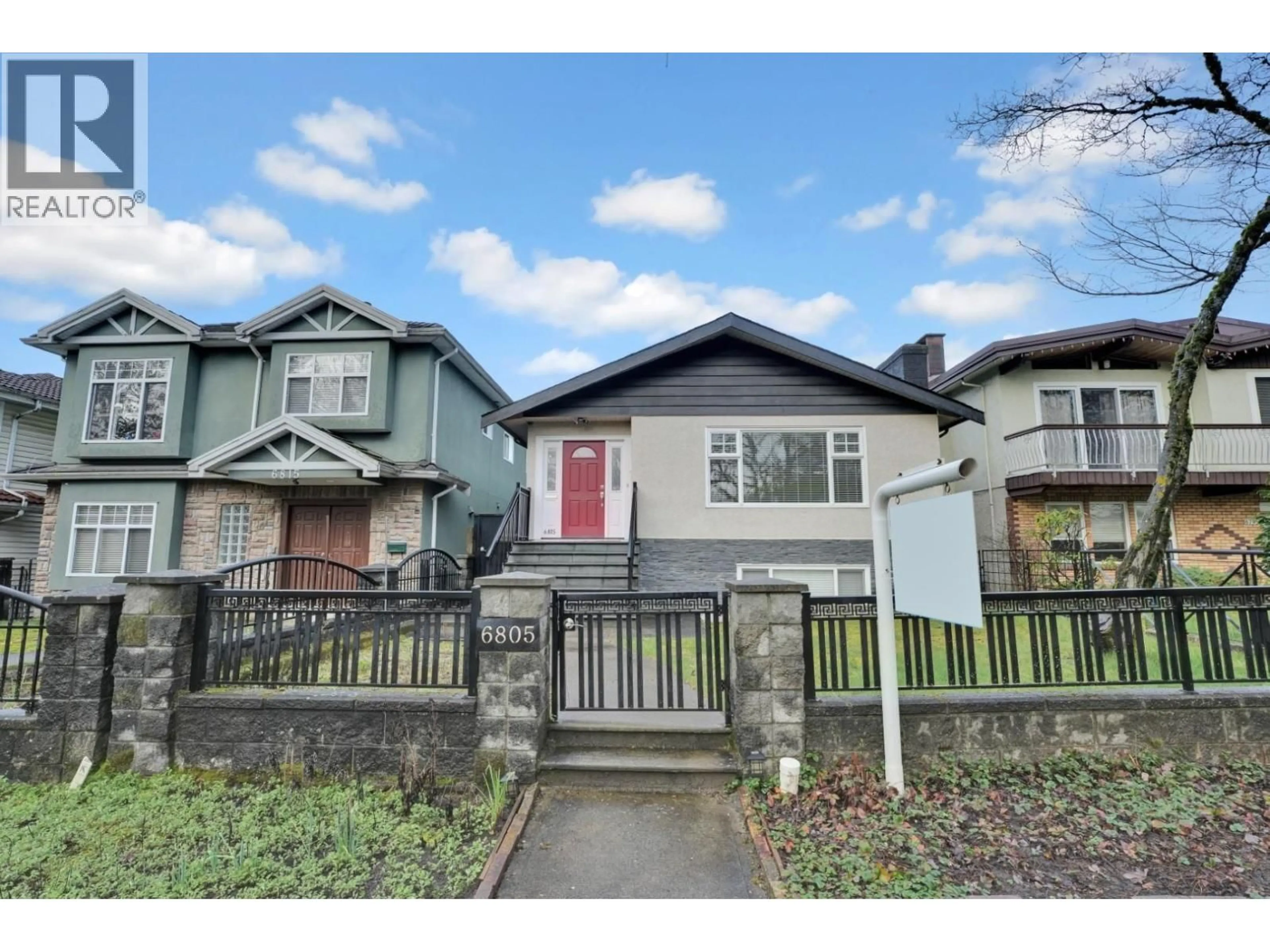 Home with vinyl exterior material, street for 6805 SHERBROOKE STREET, Vancouver British Columbia V5X4C9