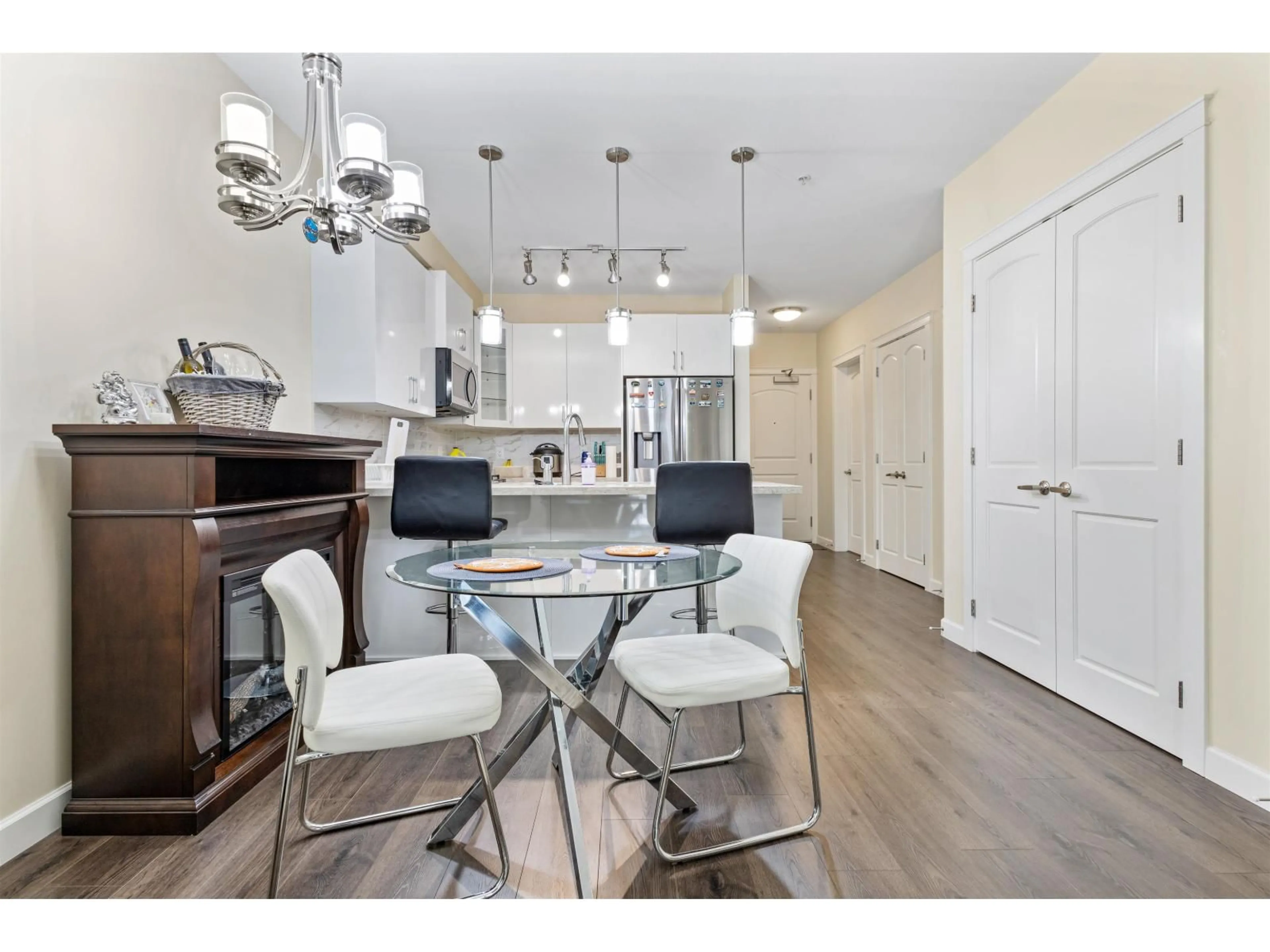 Open concept kitchen, wood/laminate floor for 206 - 8538 203A STREET, Langley British Columbia V2Y3P9