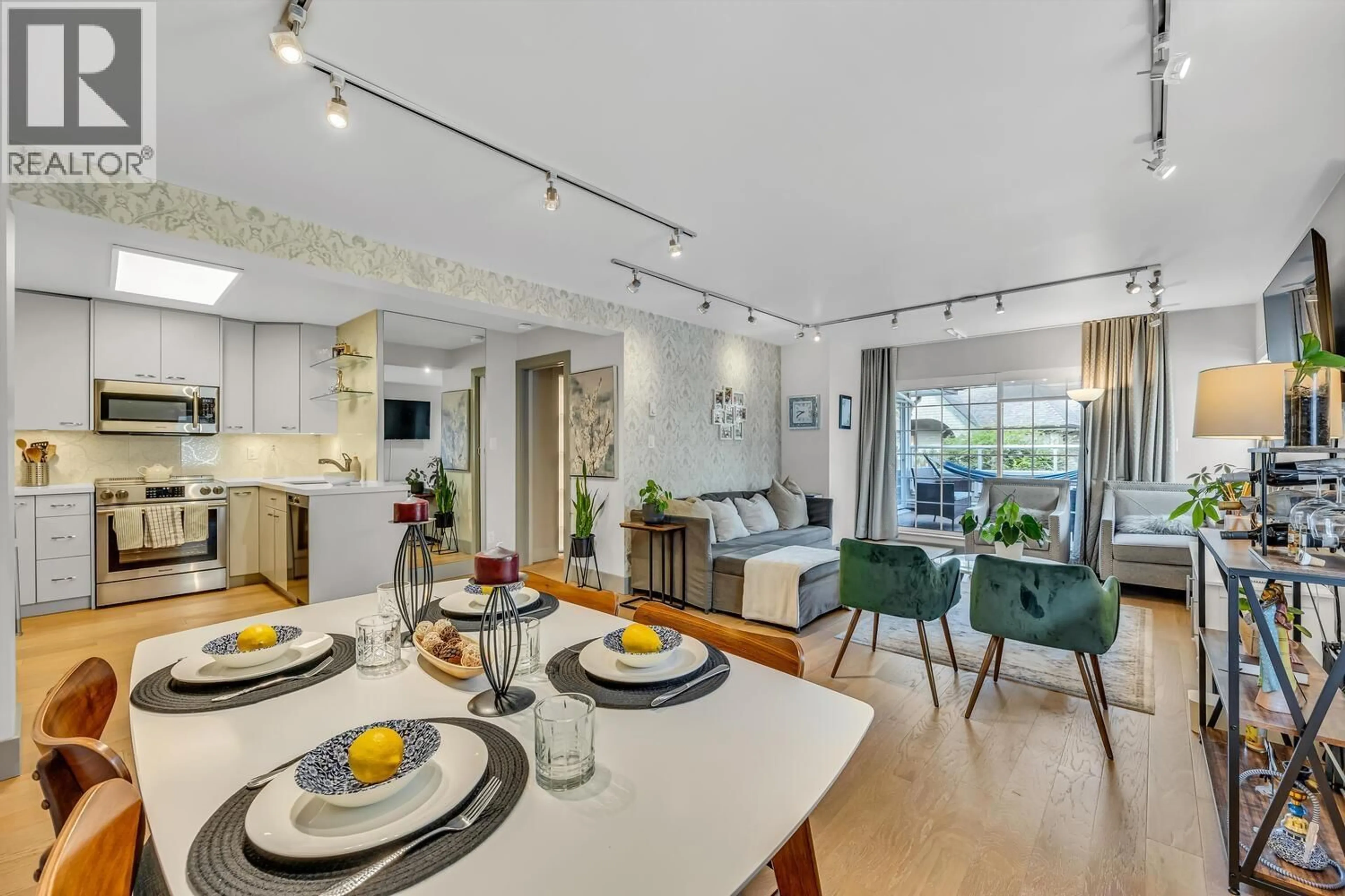 Open concept kitchen, unknown for 302 - 3461 CURLE AVENUE, Burnaby British Columbia V5G4P4