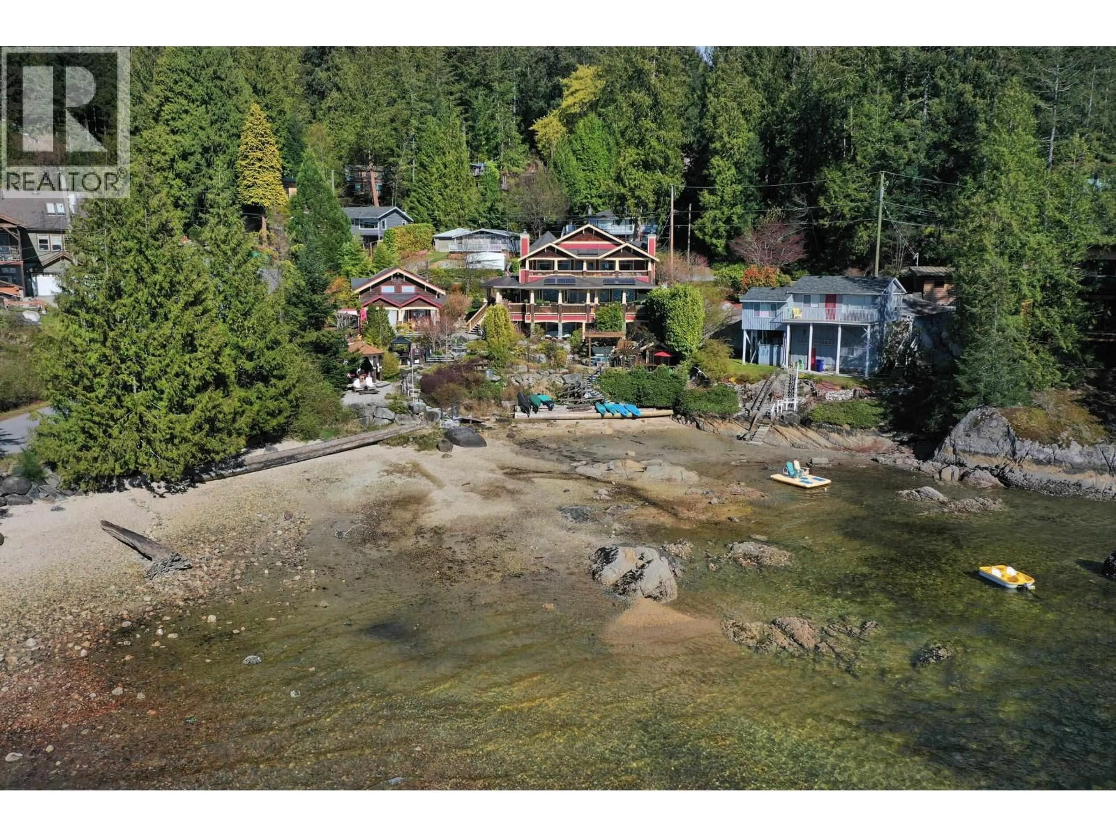 A pic from outside/outdoor area/front of a property/back of a property/a pic from drone, water/lake/river/ocean view for 7545 ISLETS PLACE, Sechelt British Columbia V7Z0C5